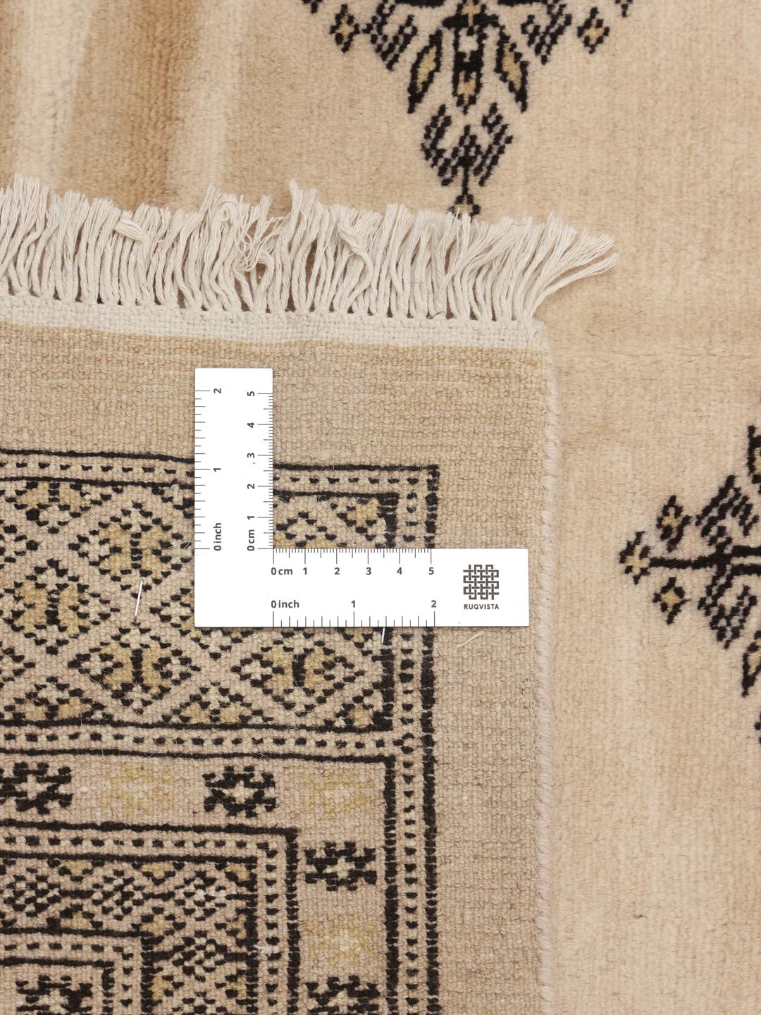 Handmade Pakistan wool rug in beige