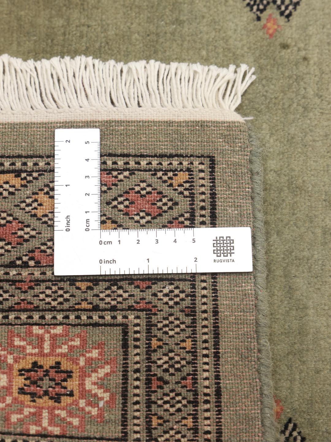 Handmade green Pakistan rug