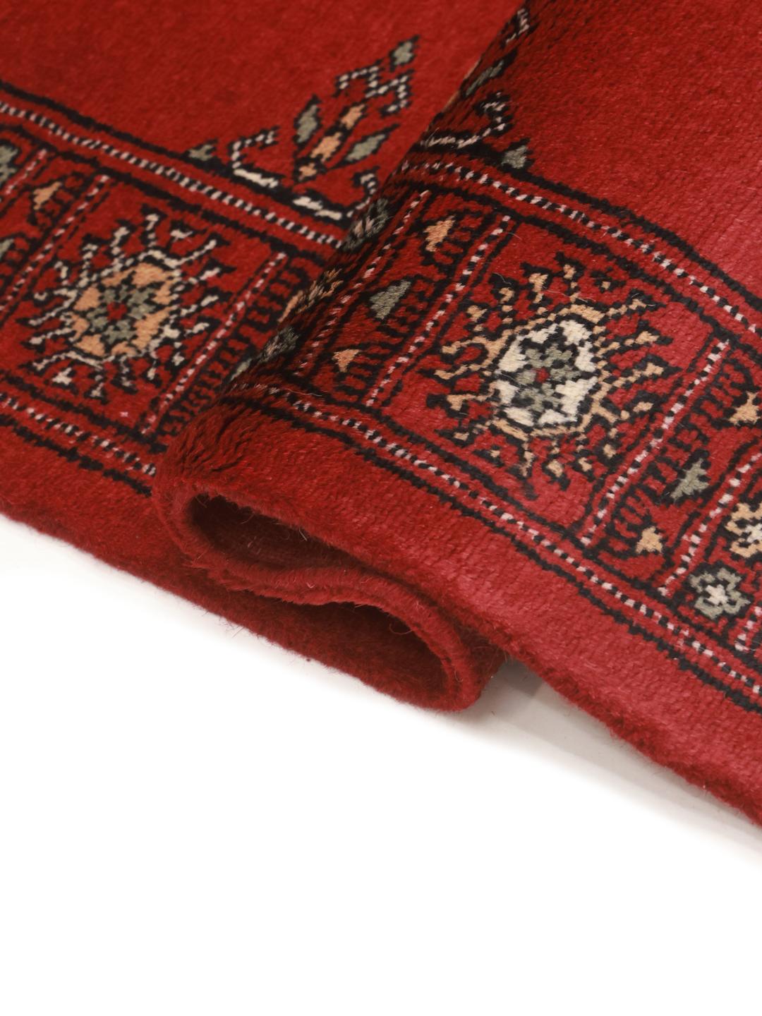 Loper vloerkleed uit Pakistan in het rood
