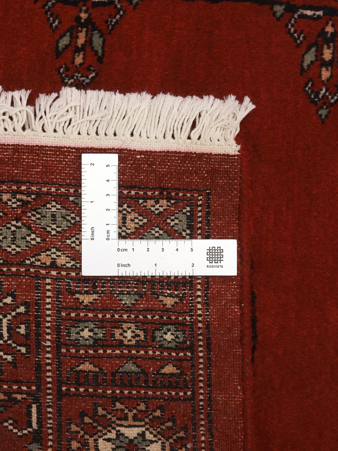 Loper vloerkleed uit Pakistan in het rood