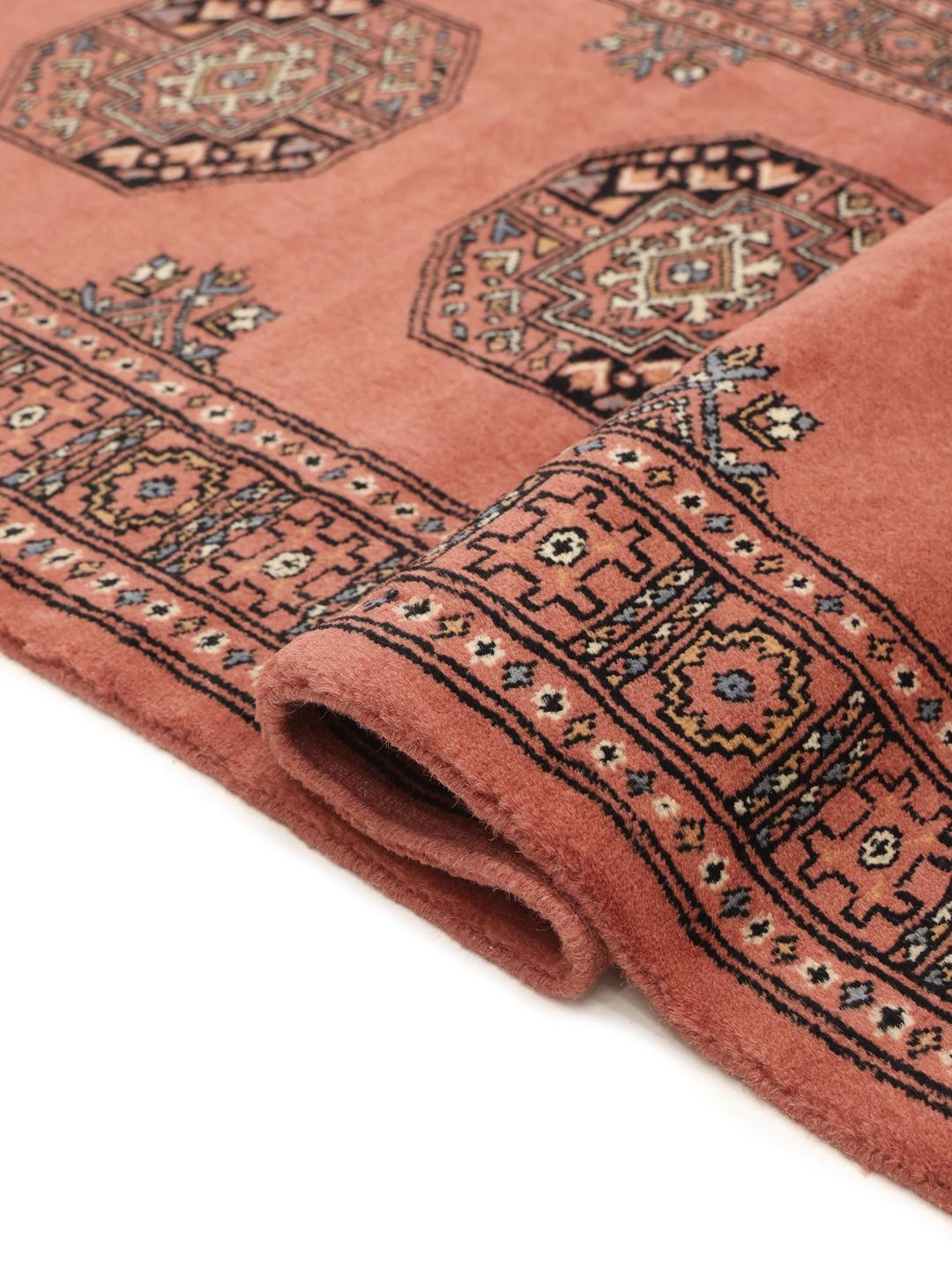Handmade Pakistan runner rug in dark-red with traditional wool guls