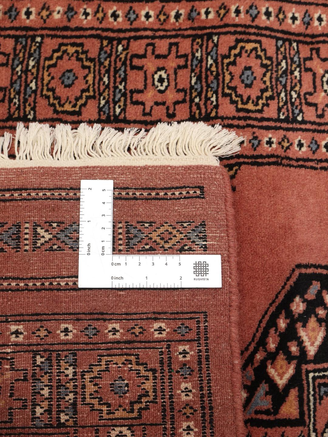 Handmade Pakistan runner rug in dark-red with traditional wool guls