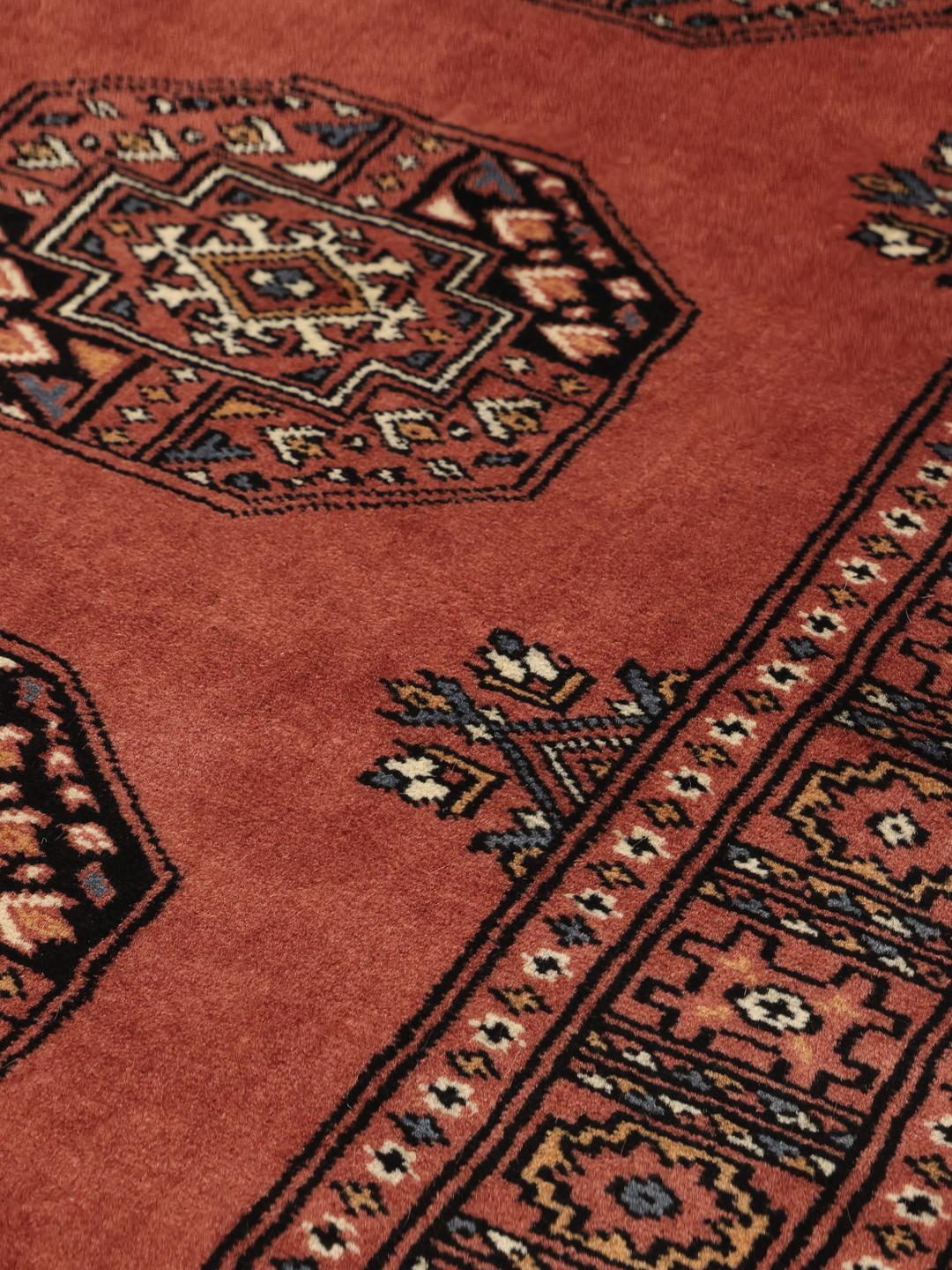 Pakistan Bokhara runner rug in red with geometric motifs