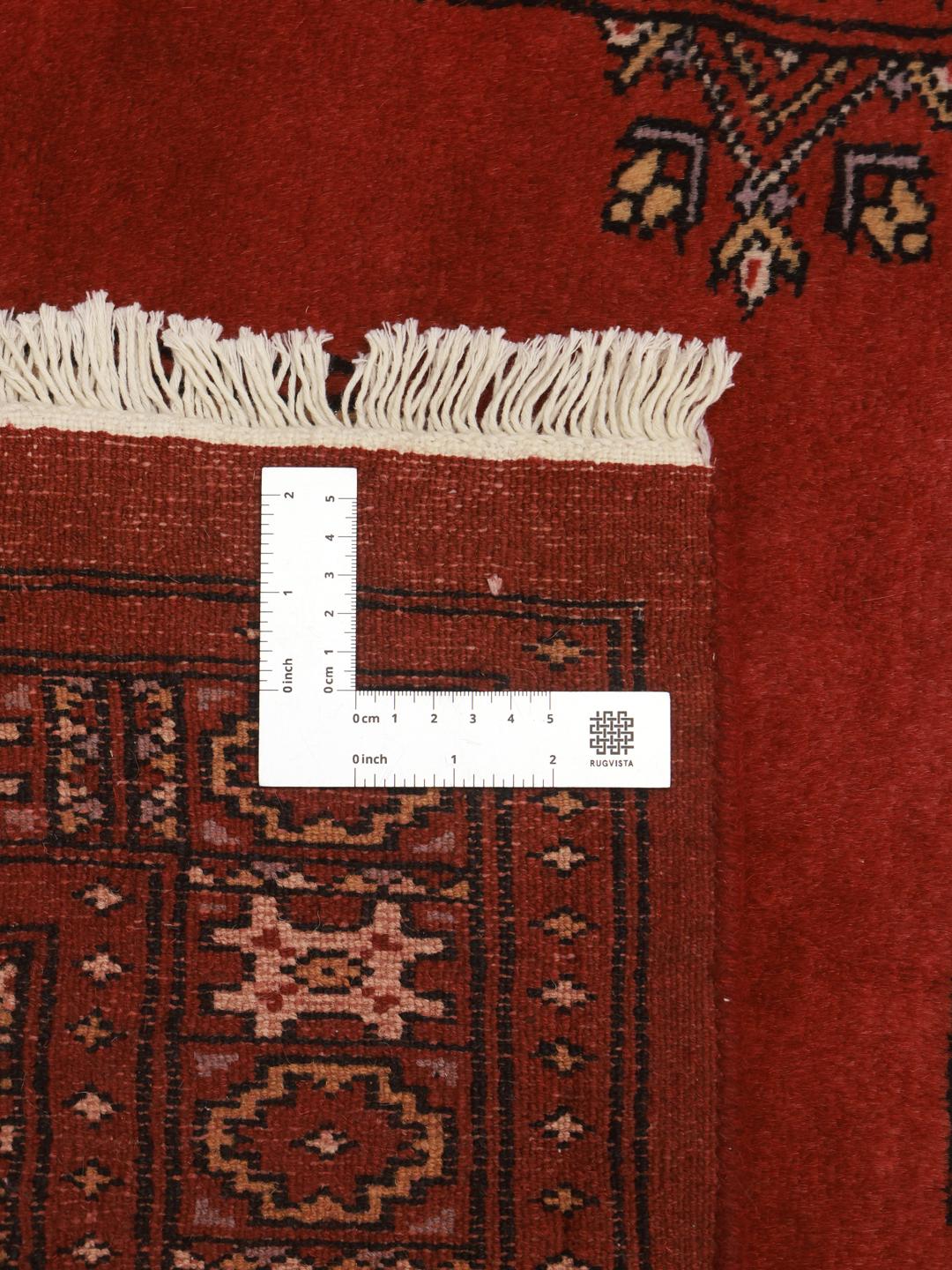 Handgemaakte Pakistaanse rode loper