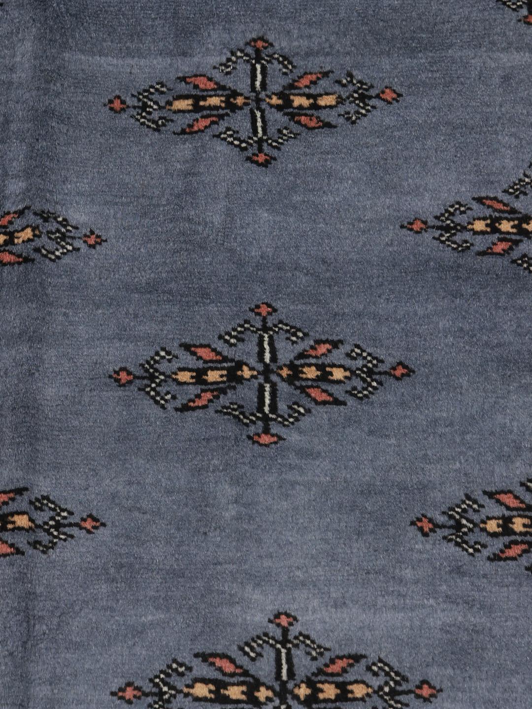 Handmade Pakistan wool rug in blue with traditional patterns