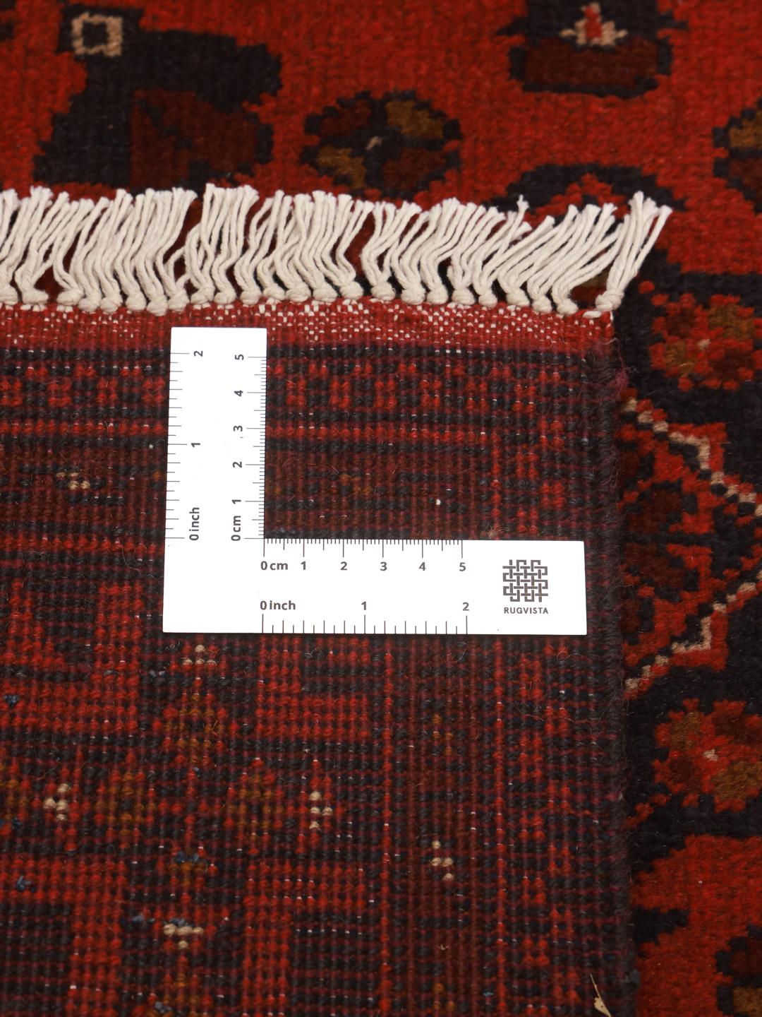 Afghaans Khal Mohammadi vloerkleed in donkerrood met traditionele geometrische patronen