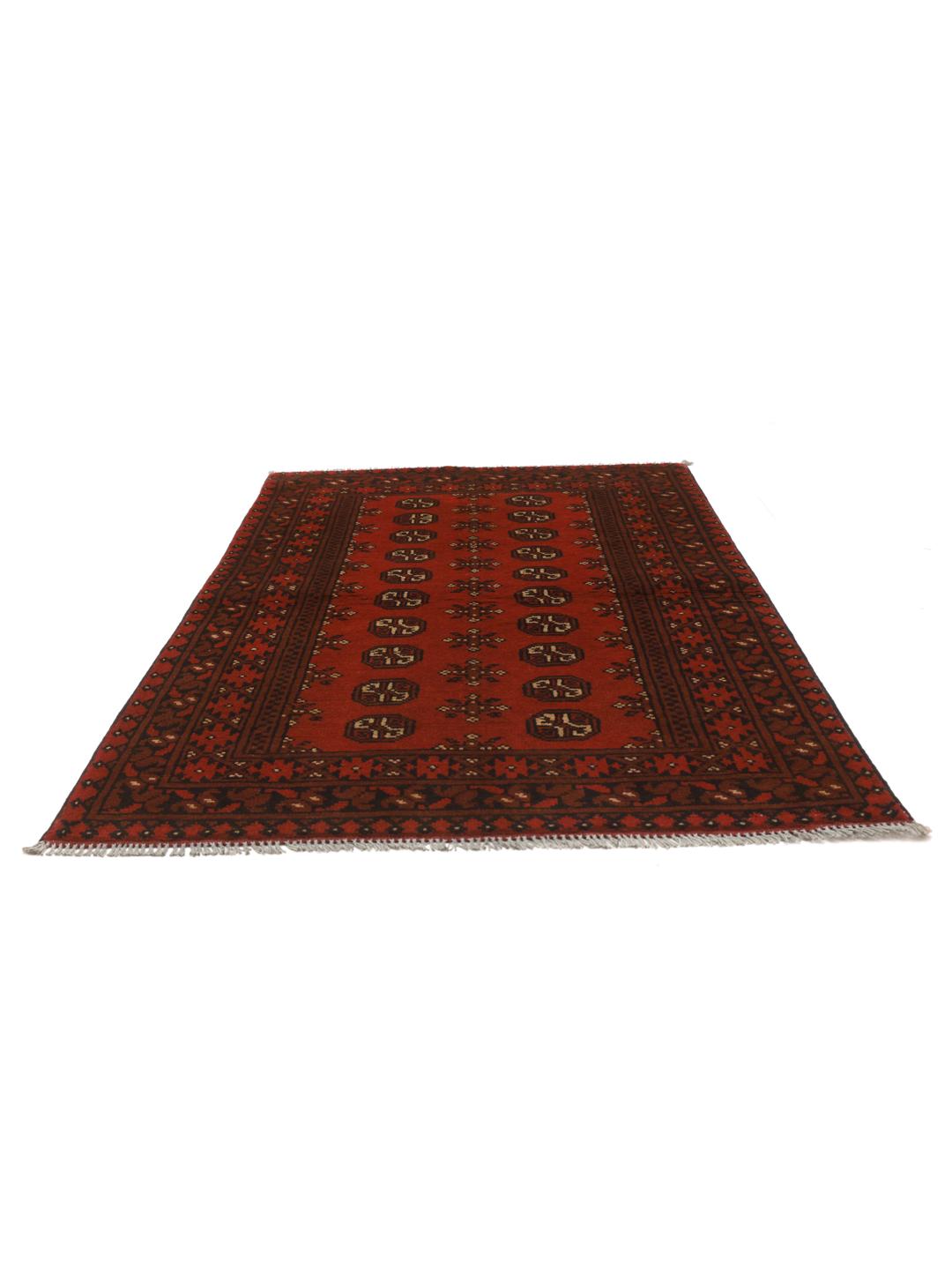 Handmade red Afghan rug with traditional motifs