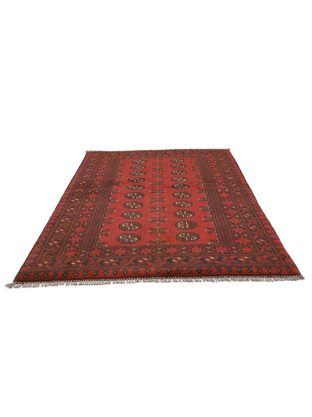 Handmade red Afghan rug with traditional motifs