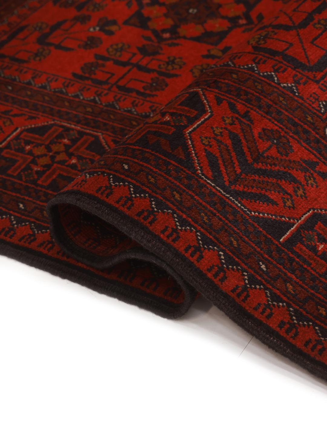 Vloerkleed uit Afghanistan in het rood