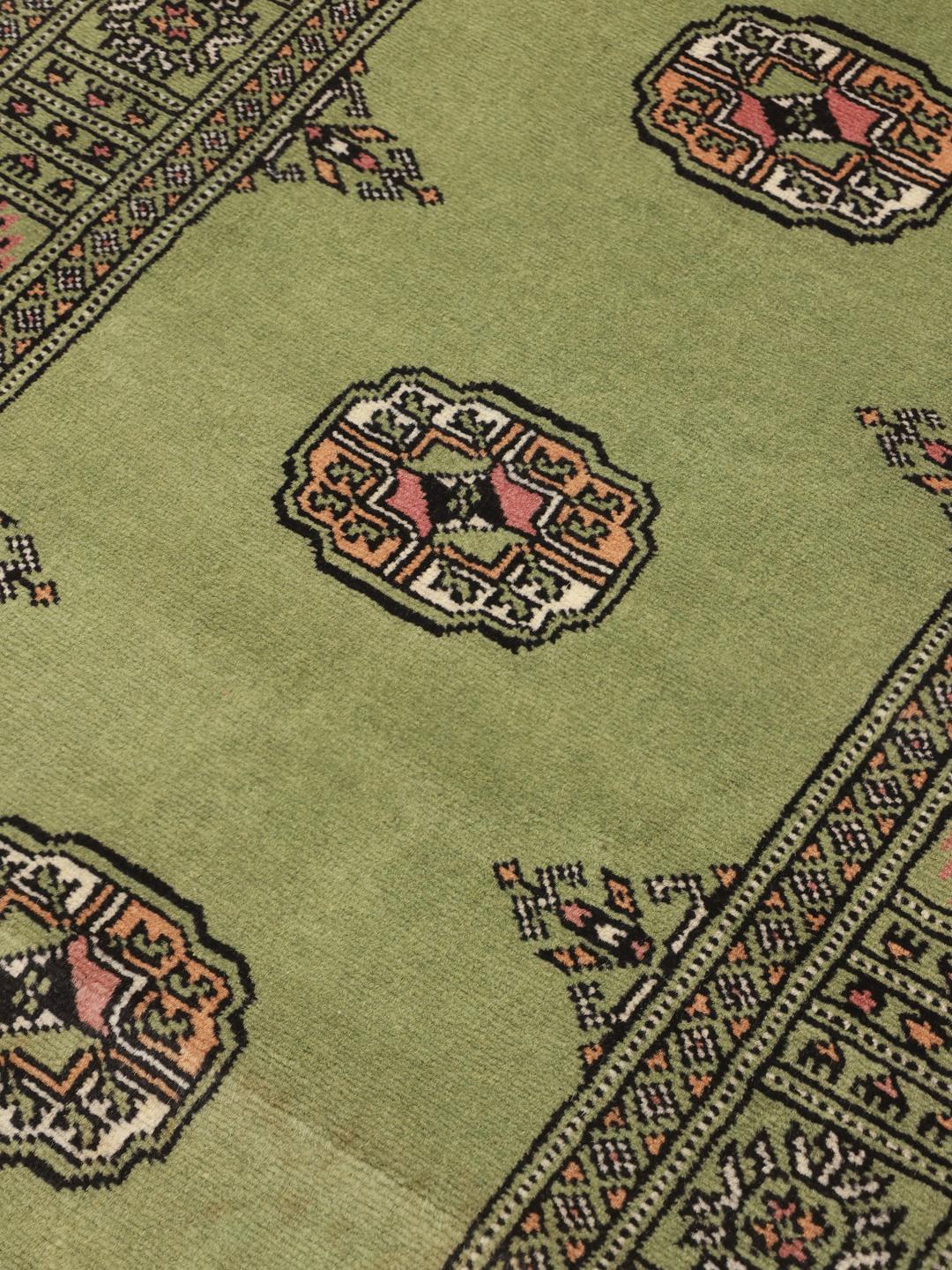 Runner rug from Pakistan in light-green with traditional patterns