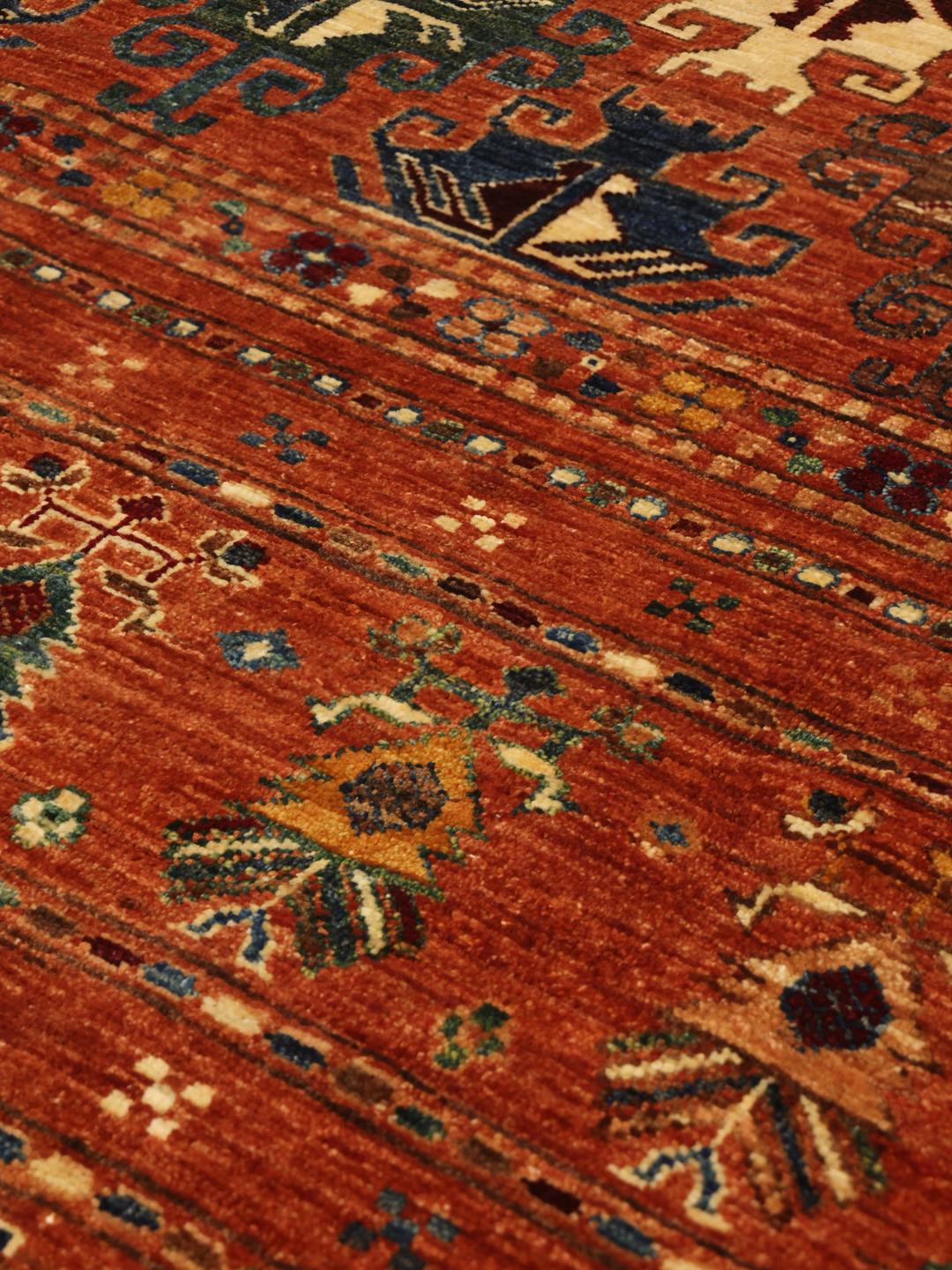 Handmade wool rug from Afghanistan in red