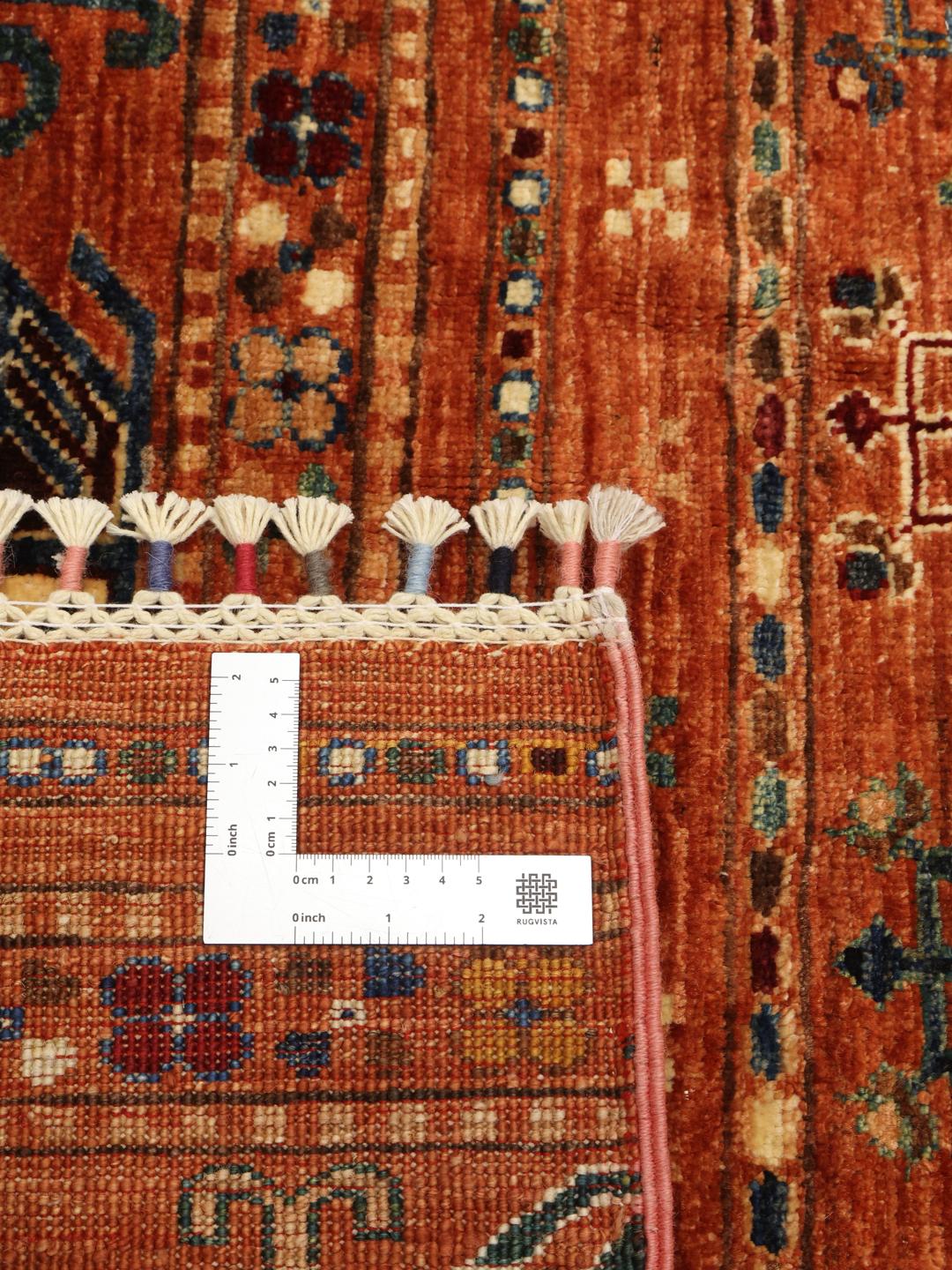 Handmade wool rug from Afghanistan in red