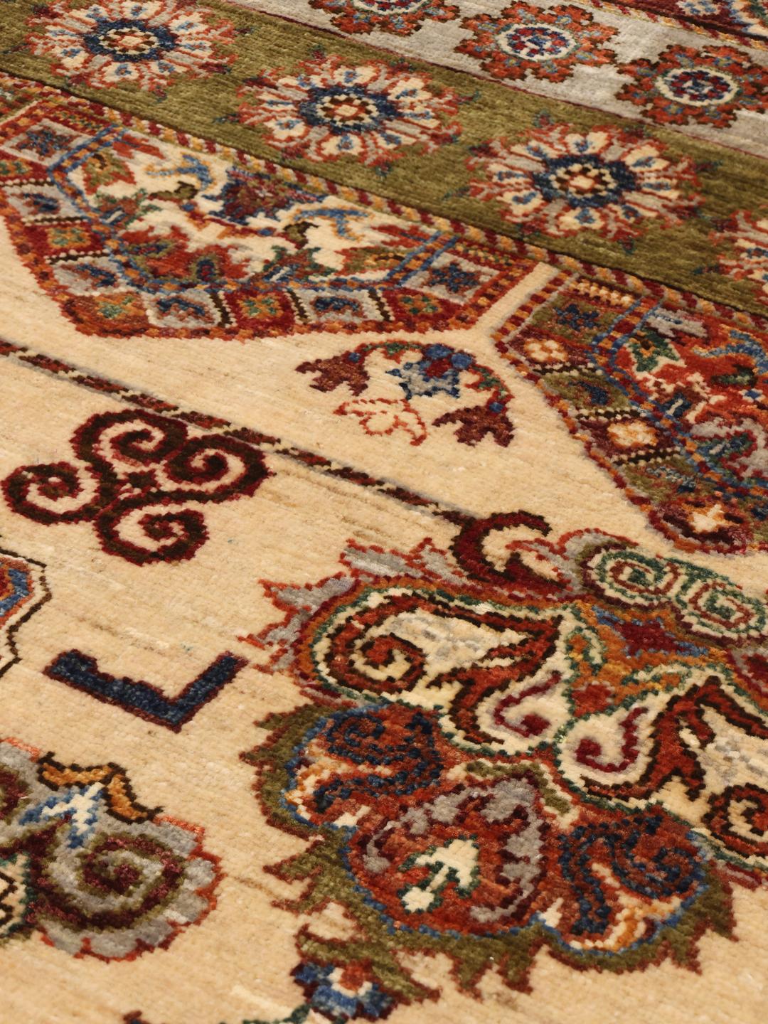 Handmade Afghan rug with beige and multicolor medallion motifs
