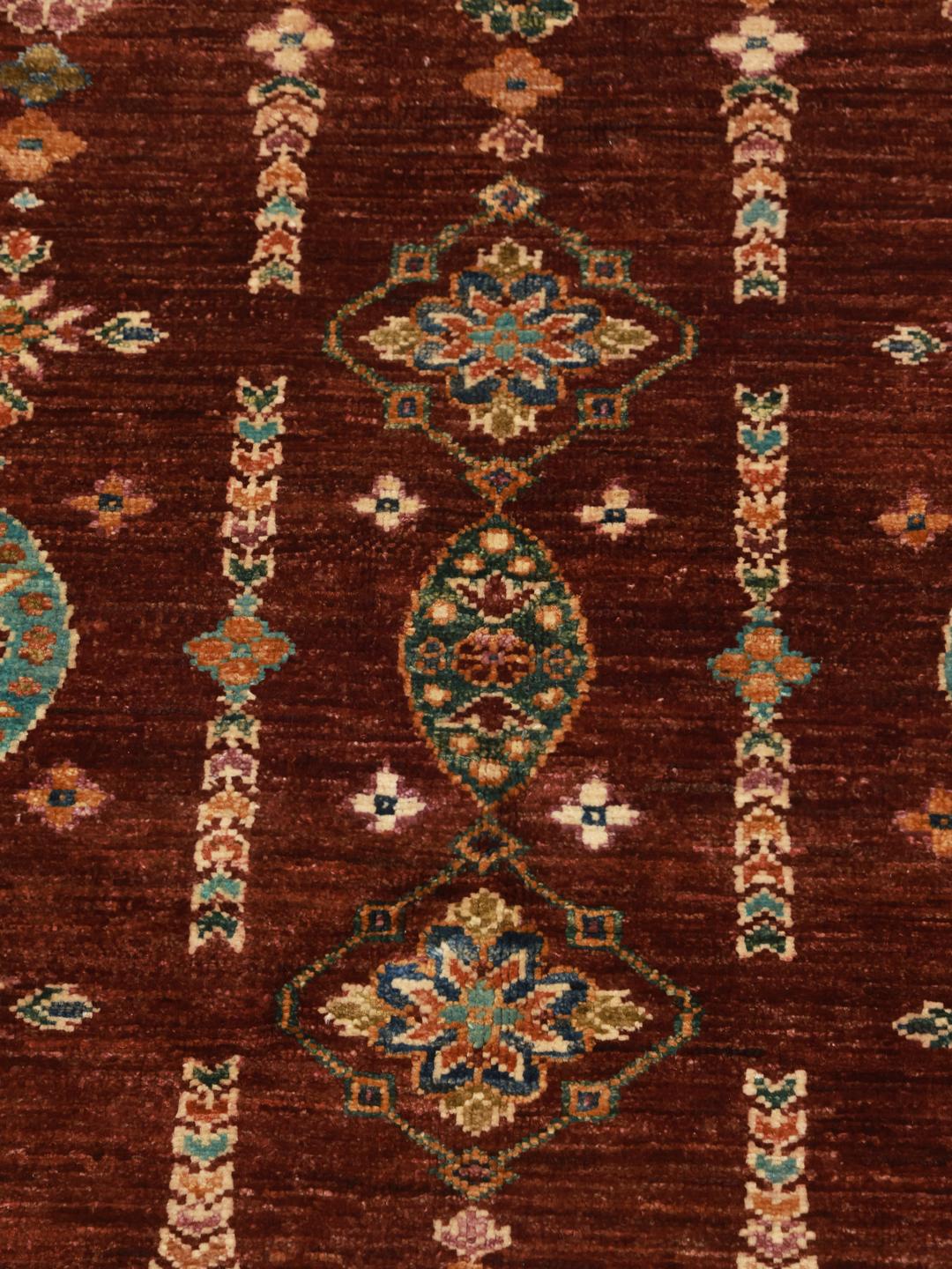 rug from Afghanistan in dark-red