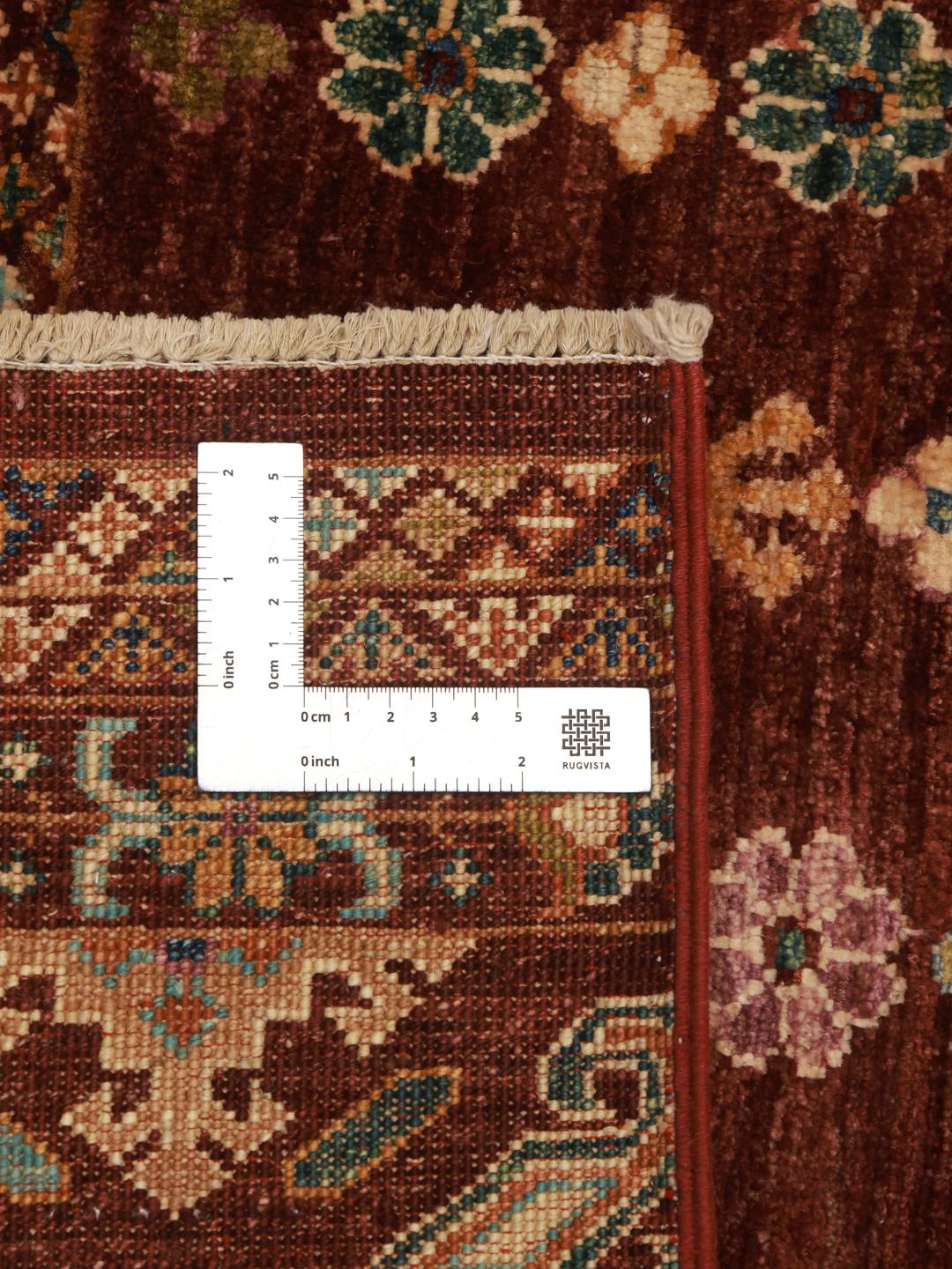 rug from Afghanistan in dark-red