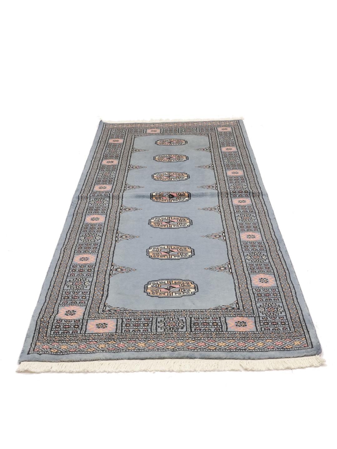 Handmade runner rug from Pakistan in blue