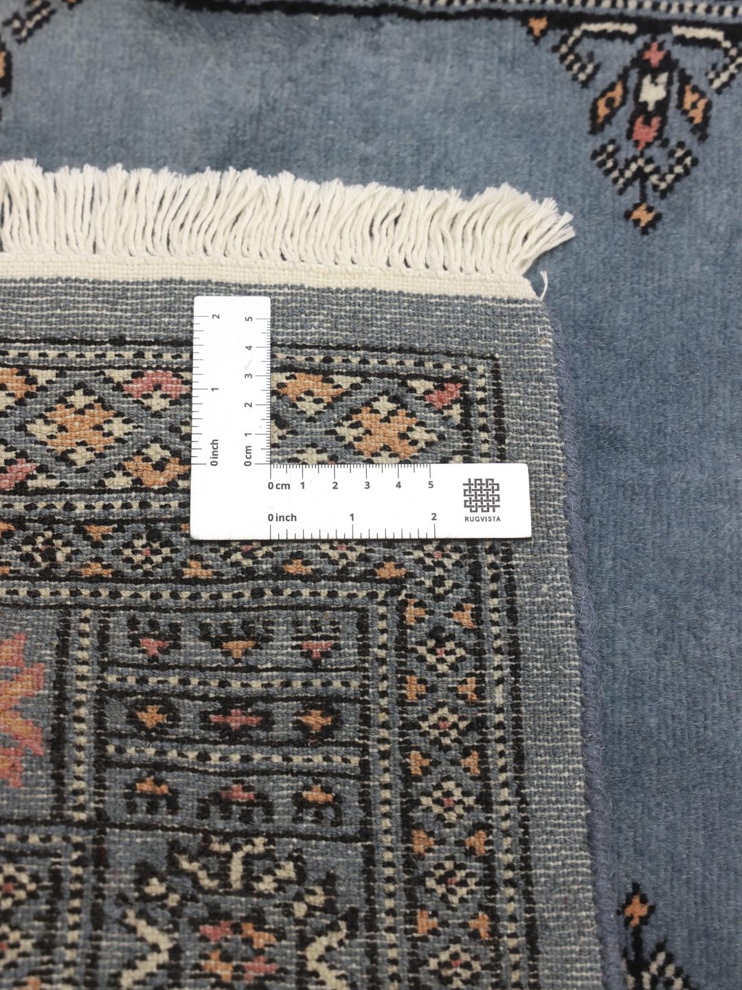 Handmade runner rug from Pakistan in blue