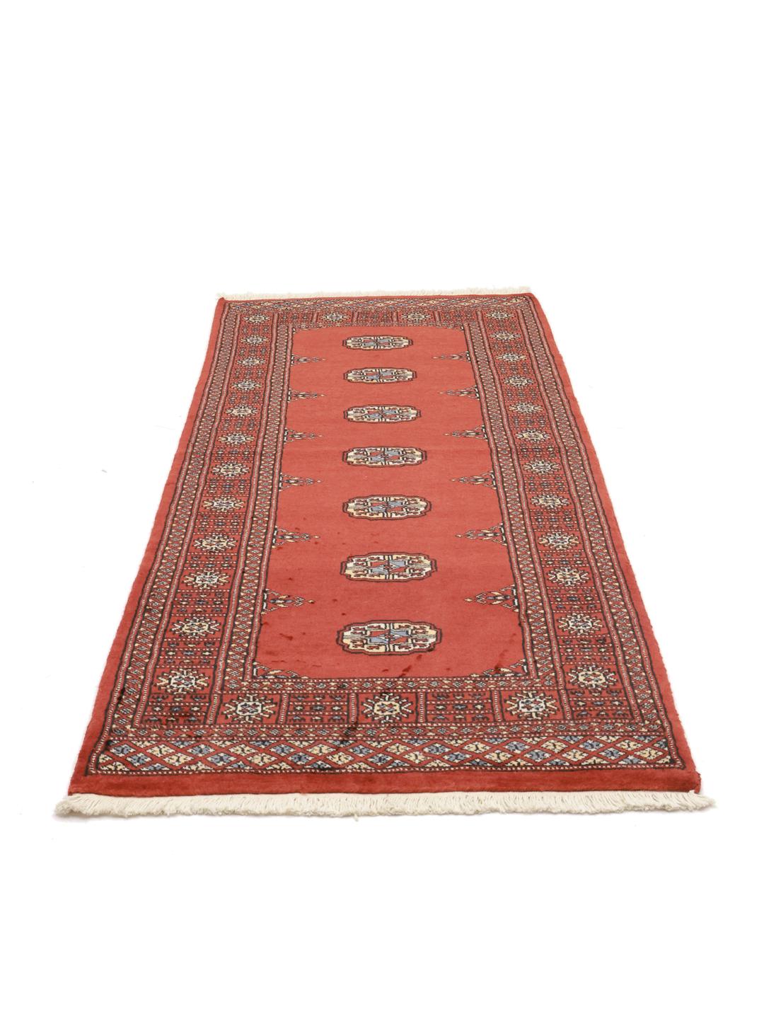 Red runner rug from Pakistan