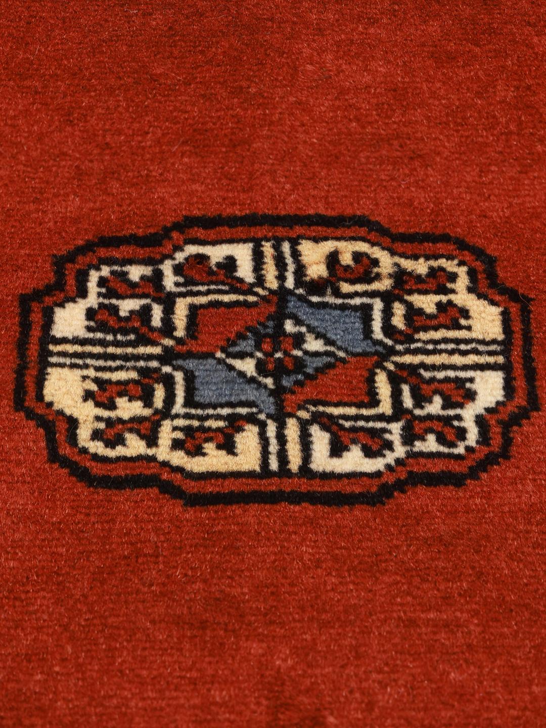 Red runner rug from Pakistan