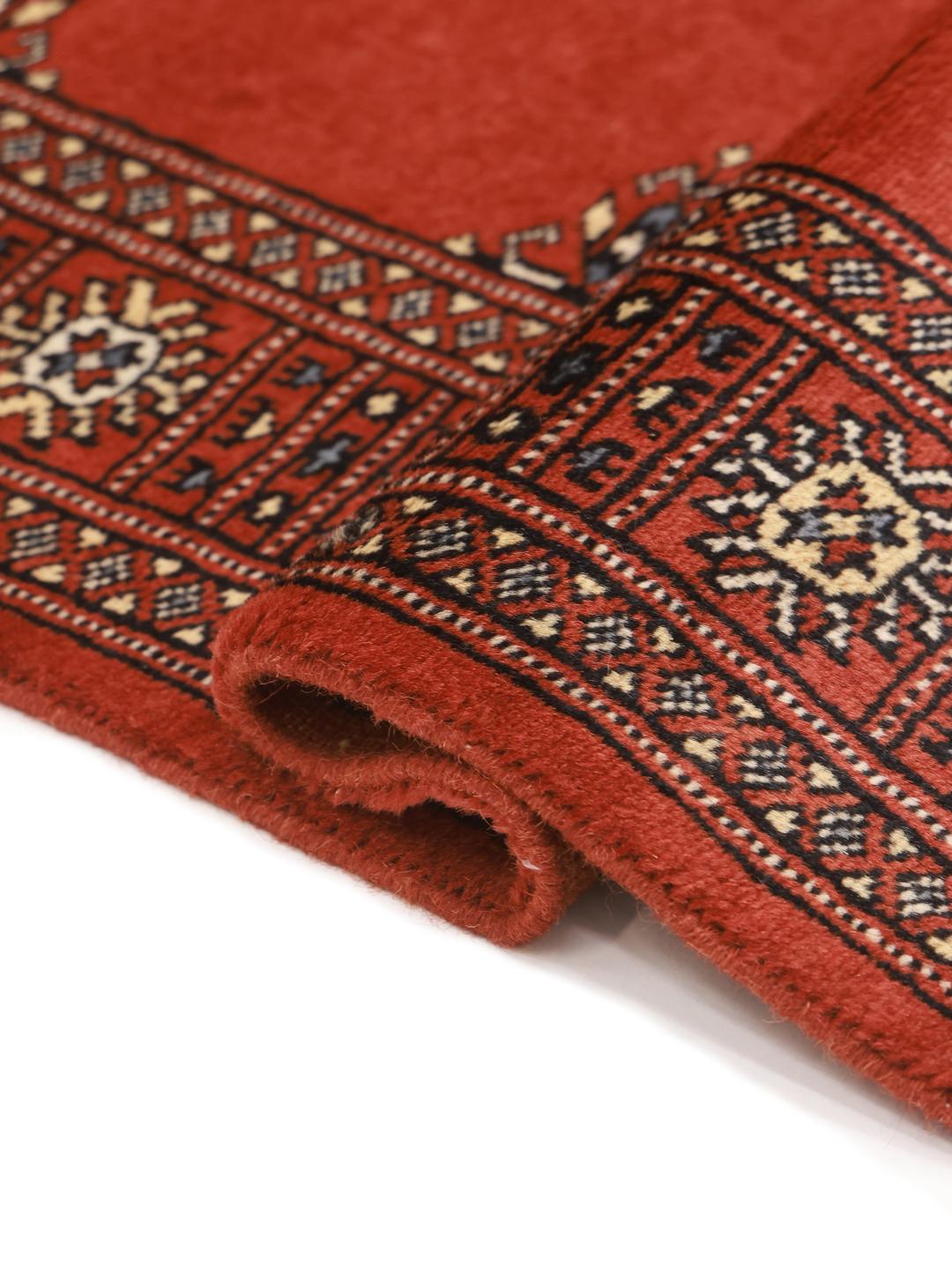Red runner rug from Pakistan
