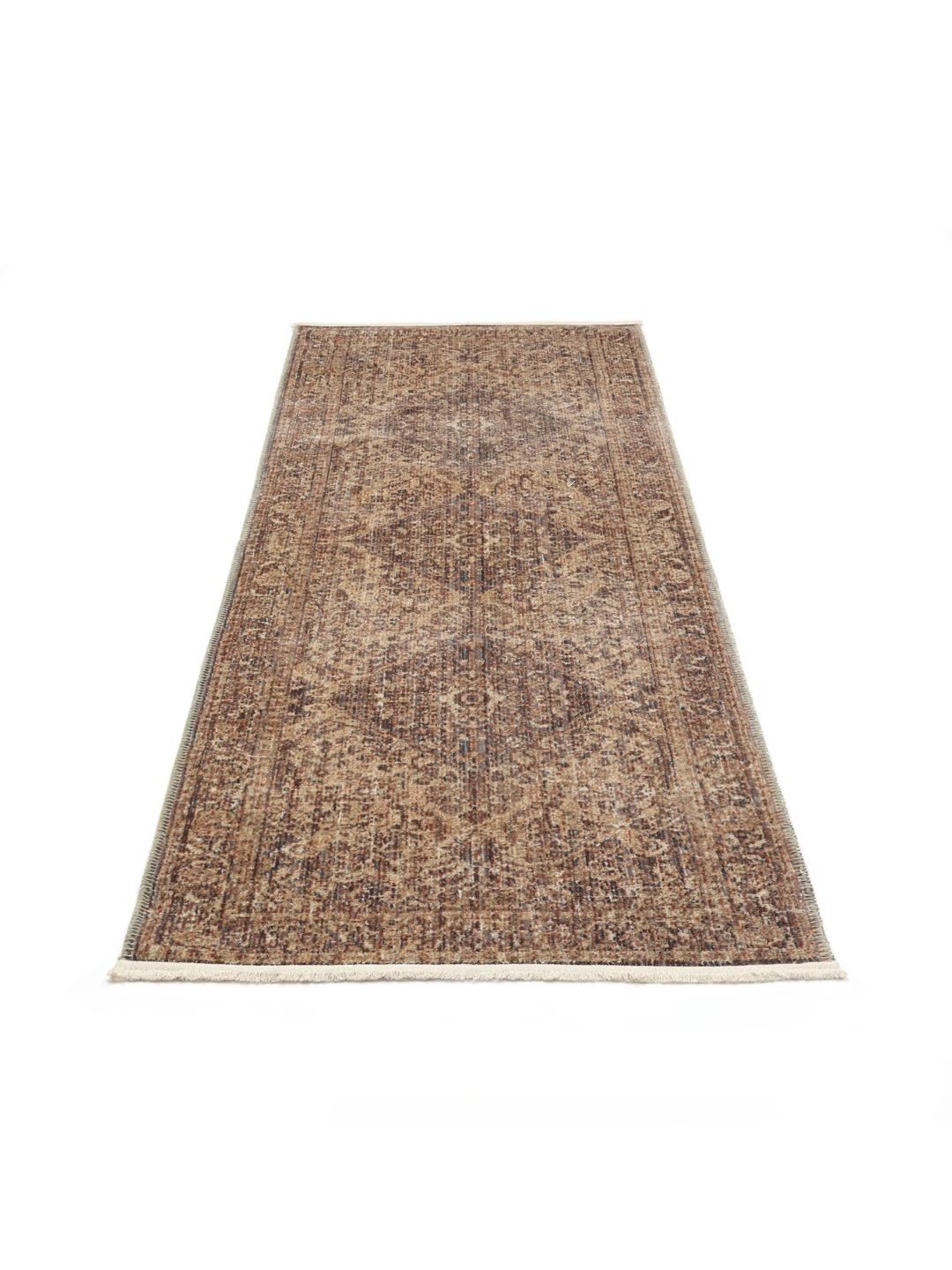 Traditionele rode vloerloper met een bloemmedaillonpatroon en delicate franjes