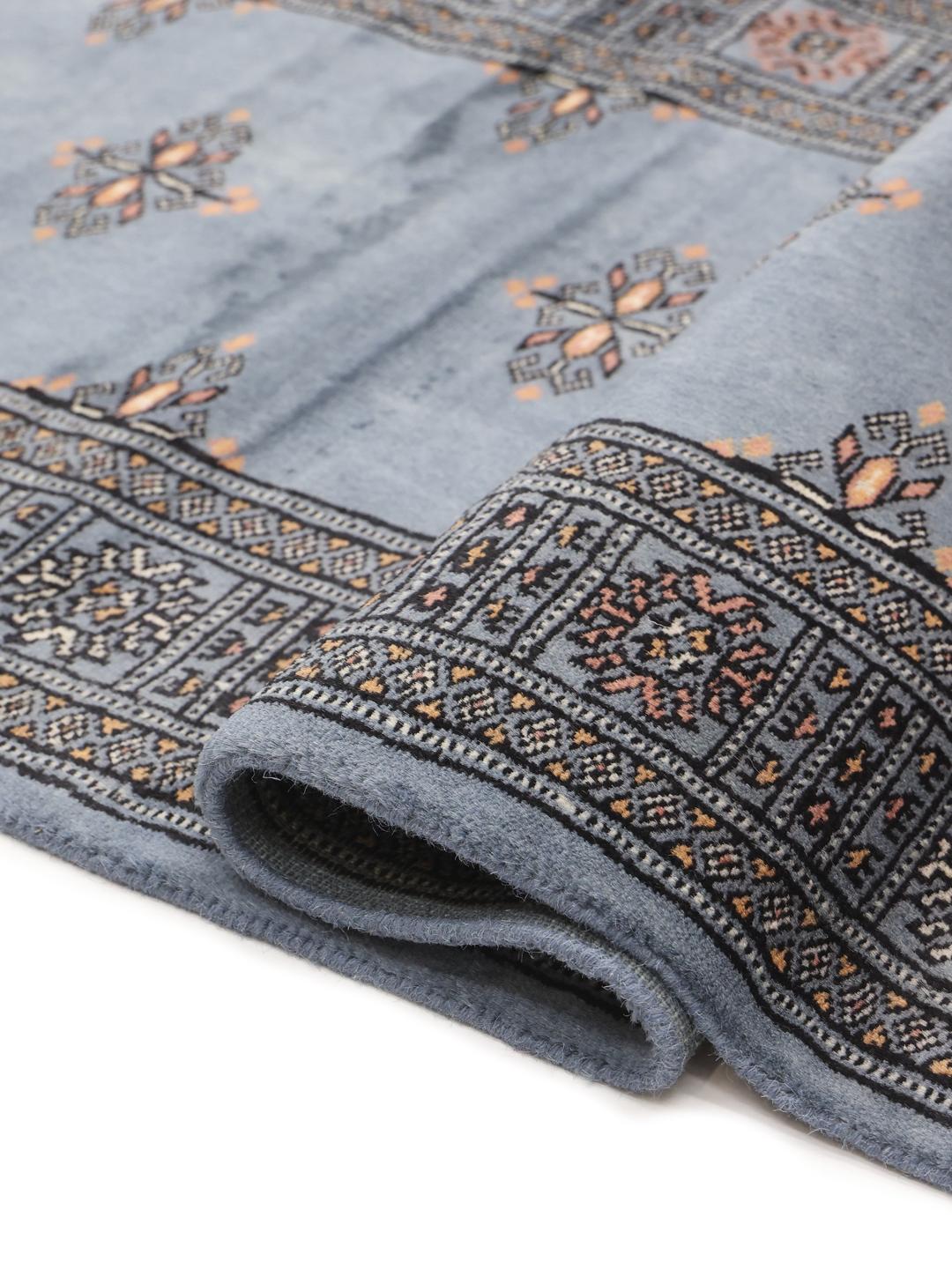 Loper kleed uit Pakistan in blauw
