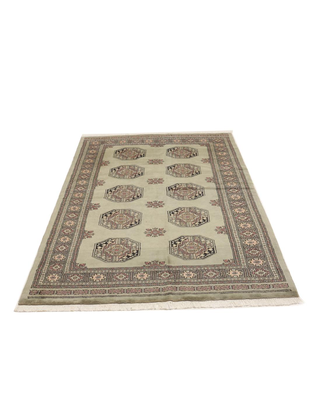 Tapis fait main du Pakistan en vert clair