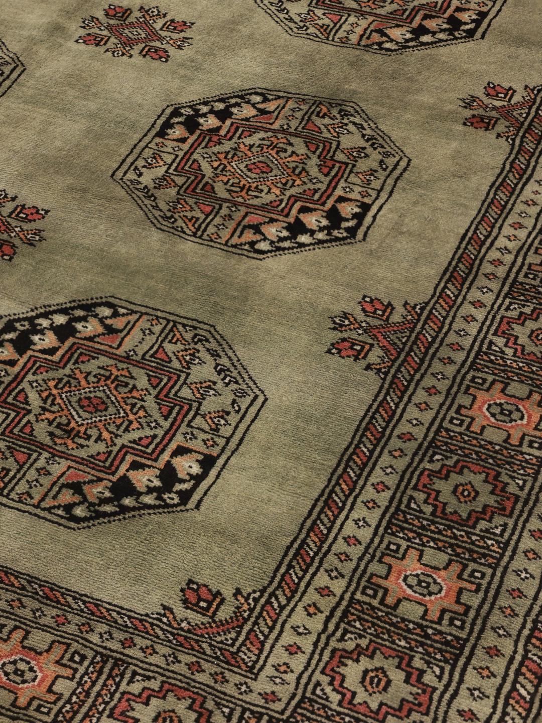 Tapis fait main du Pakistan en vert clair