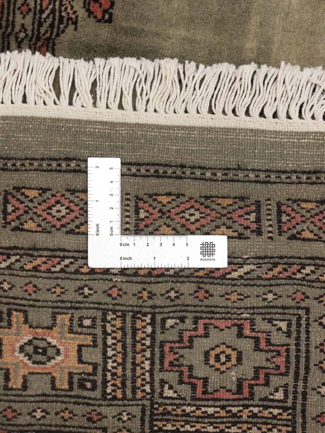 Tapis fait main du Pakistan en vert clair