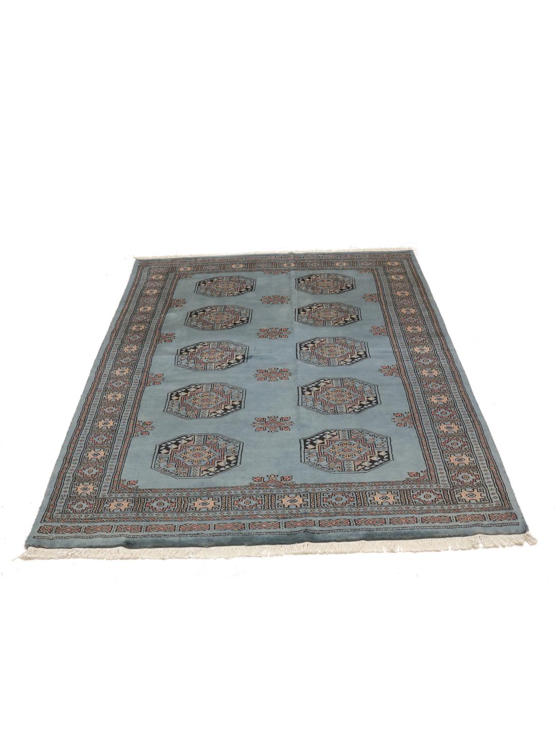 Tapis noue a la main du Pakistan en bleu