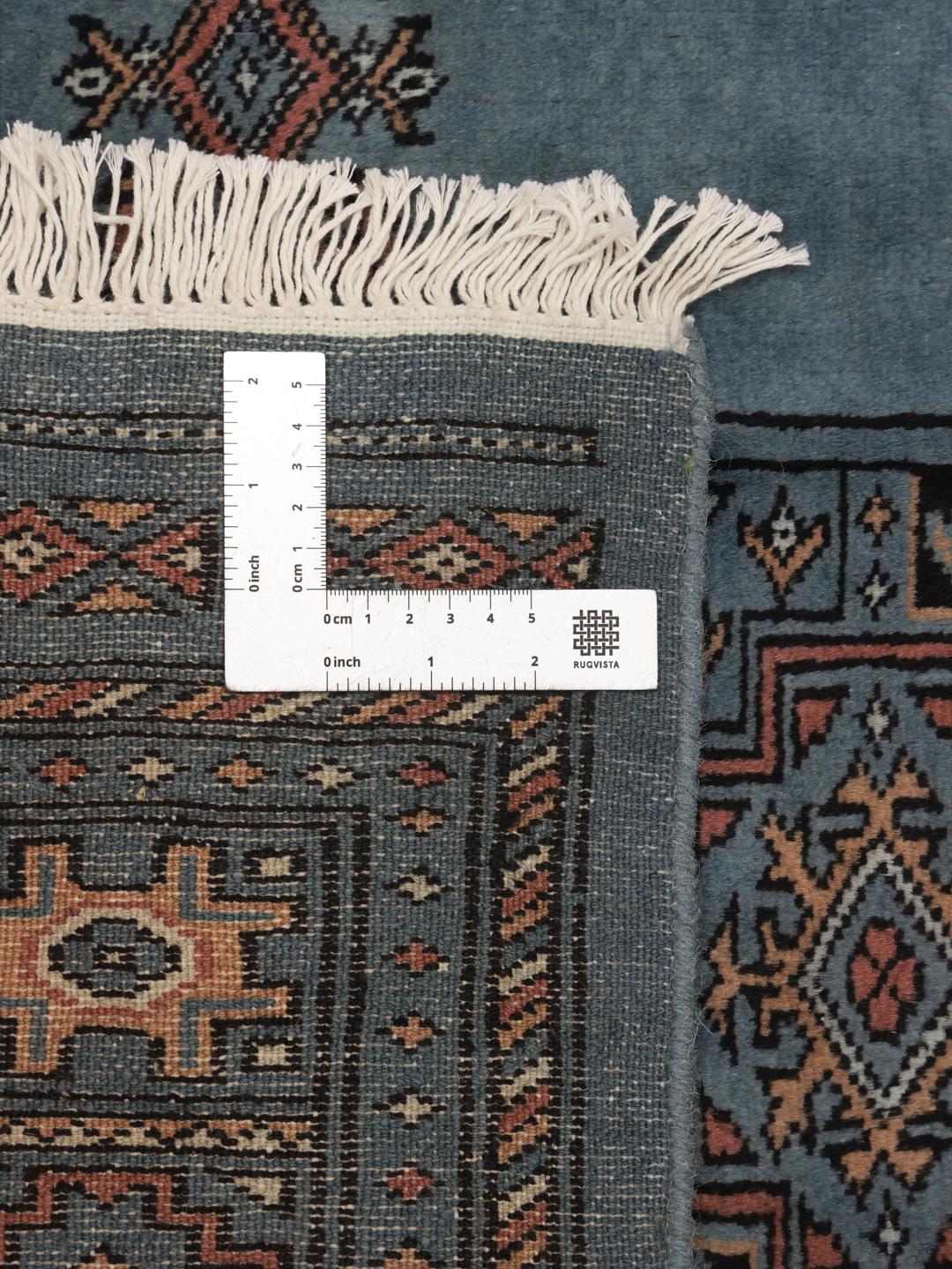 Tapis noue a la main du Pakistan en bleu