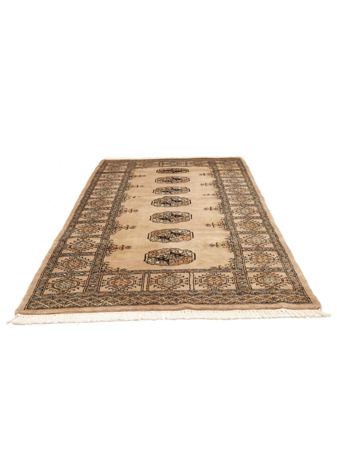 Handmade Pakistani rug in beige