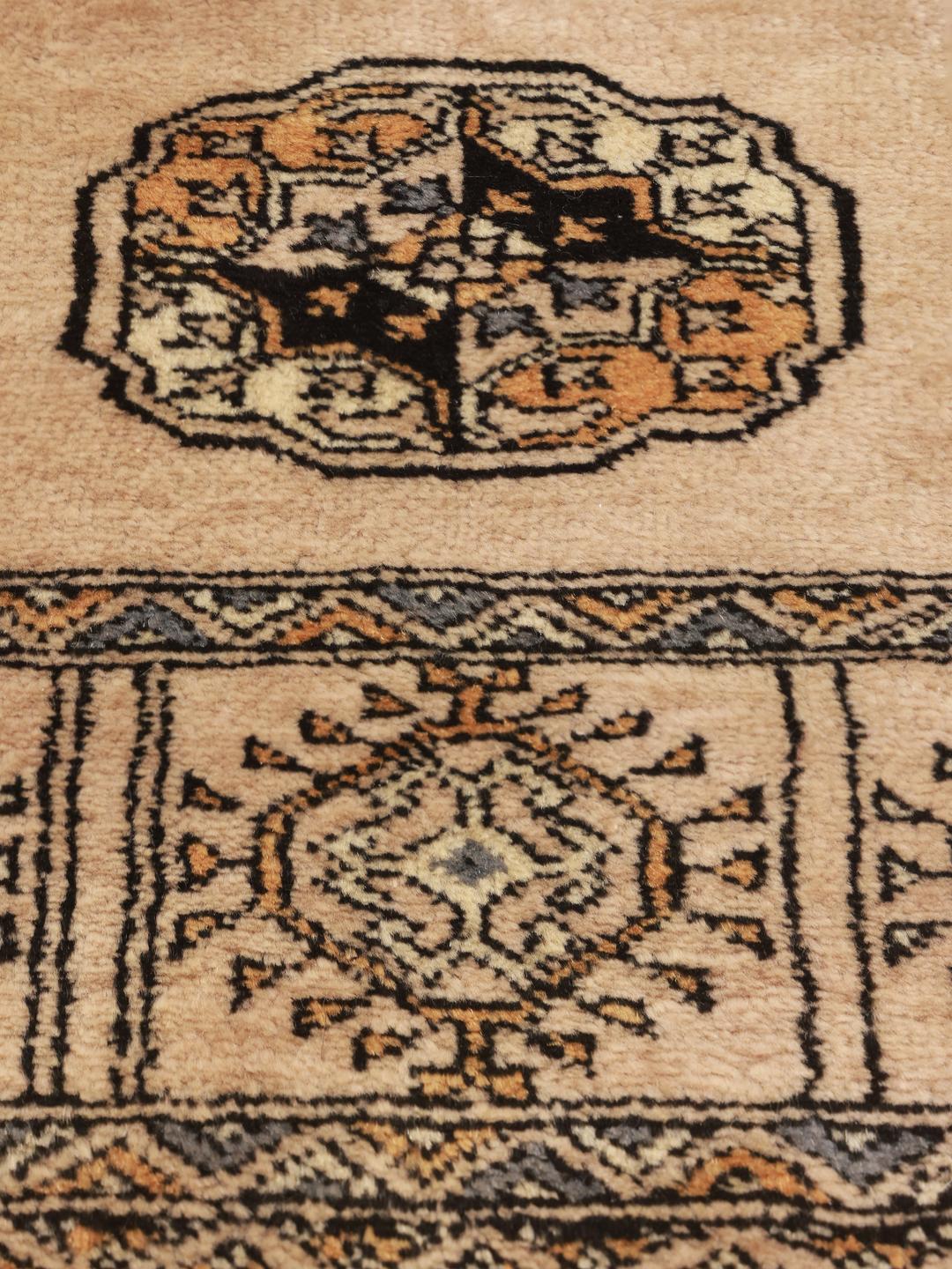 Handmade Pakistani rug in beige