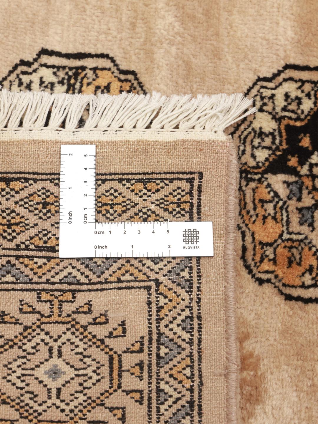 Handmade Pakistani rug in beige