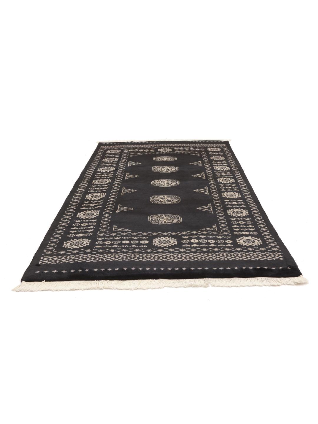 rug from Pakistan in black