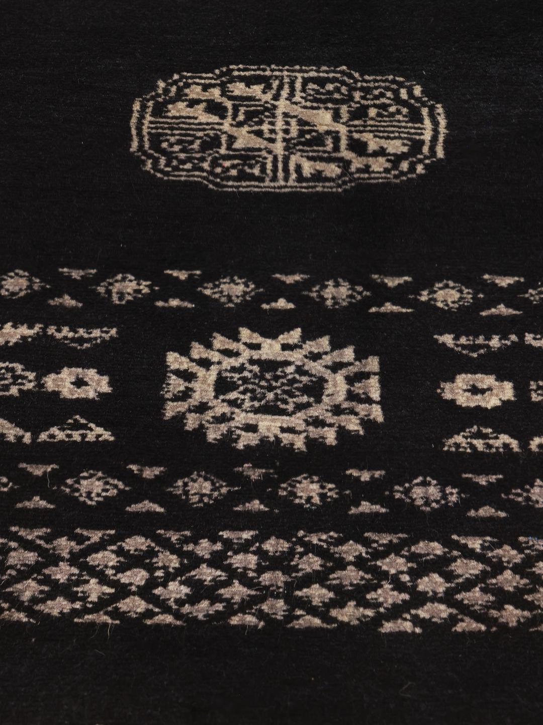 rug from Pakistan in black