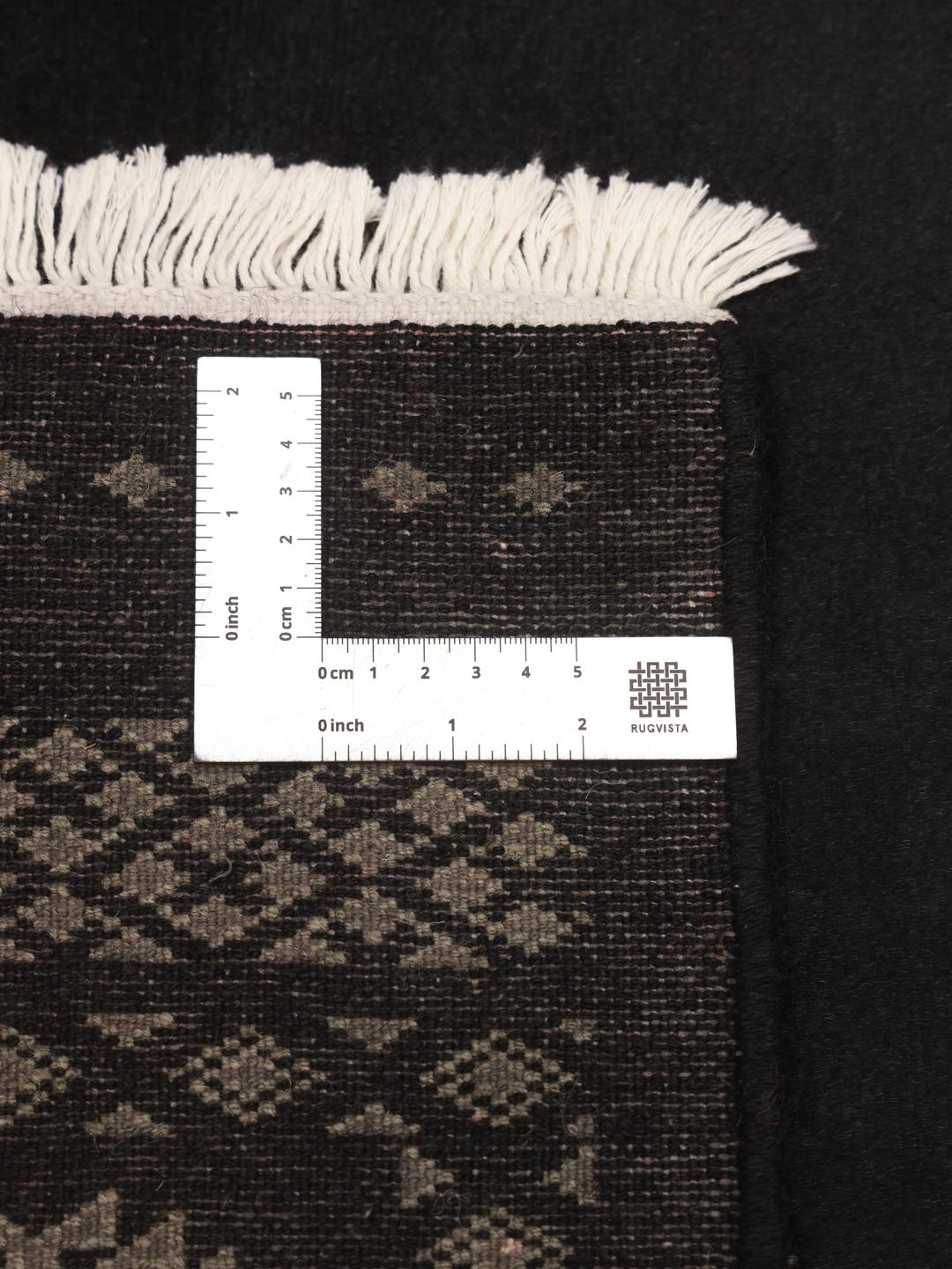 rug from Pakistan in black