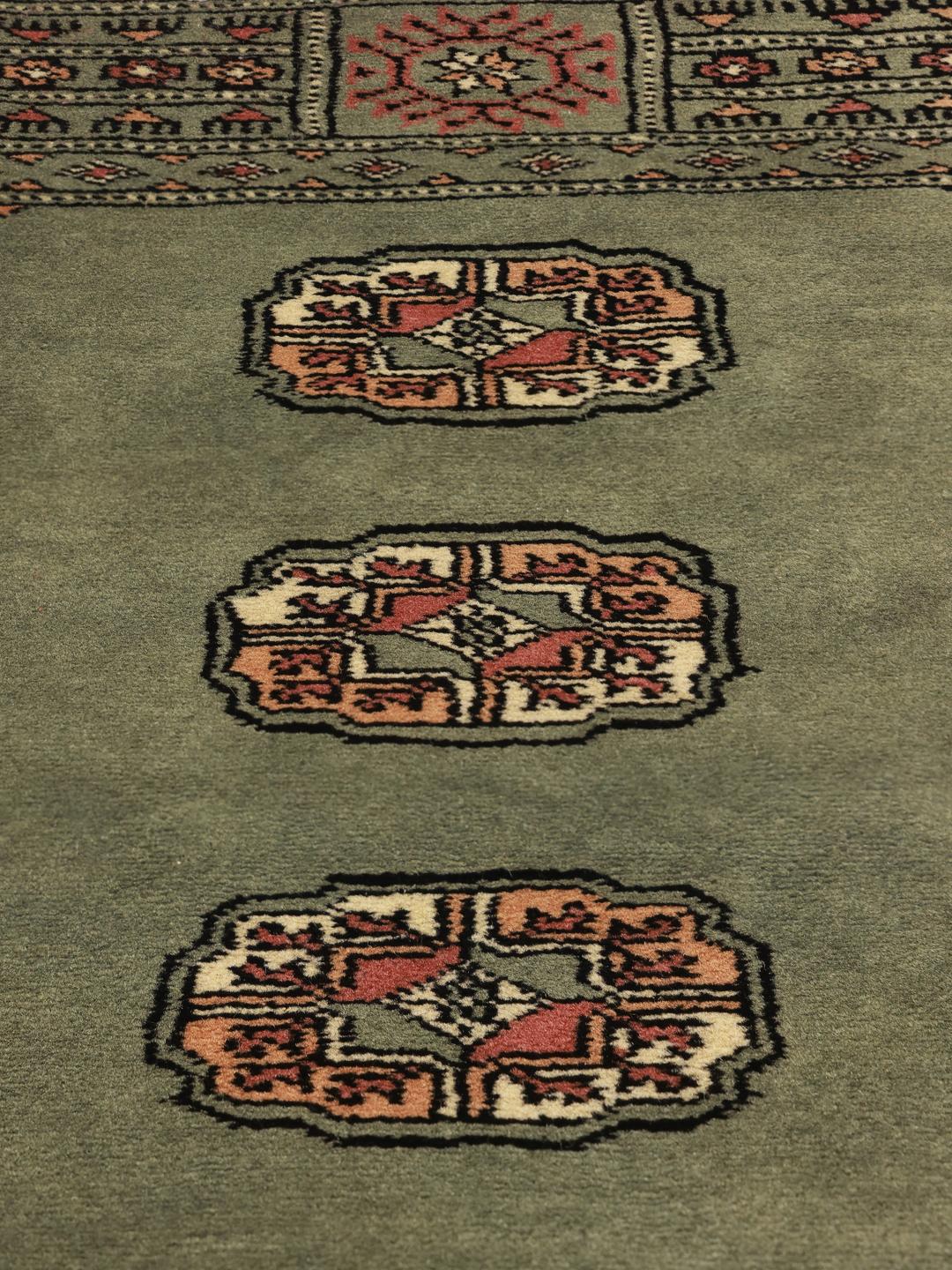 Rug from Pakistan in light-green