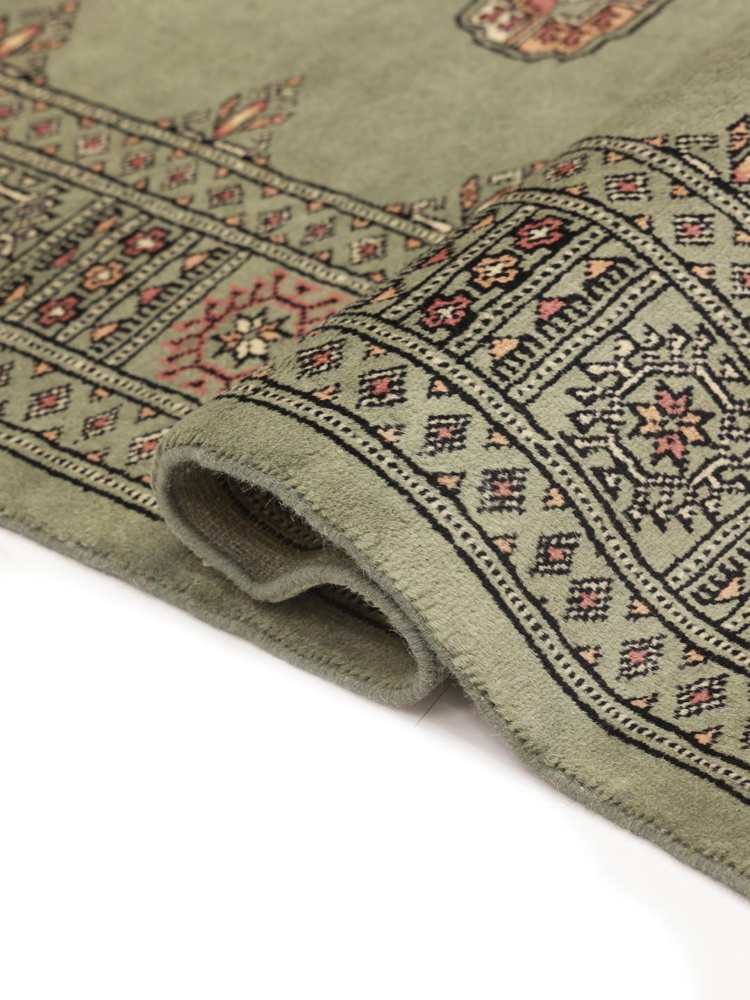Rug from Pakistan in light-green