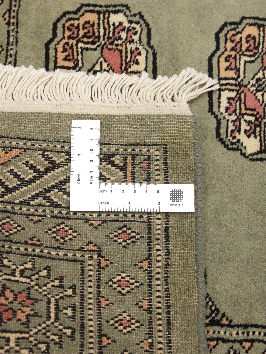 Rug from Pakistan in light-green