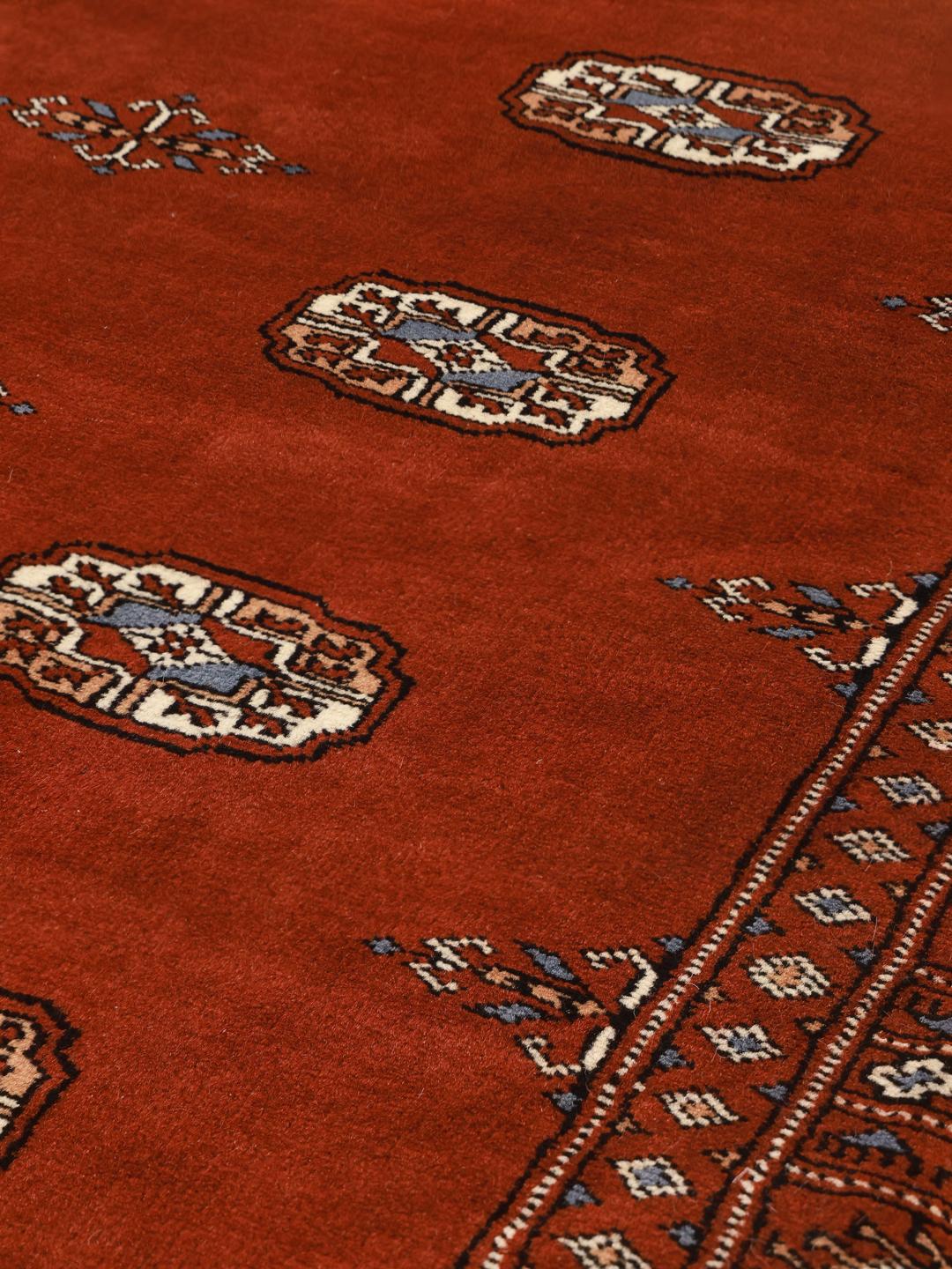 Tapis en laine du Pakistan noué à la main de couleur rouge
