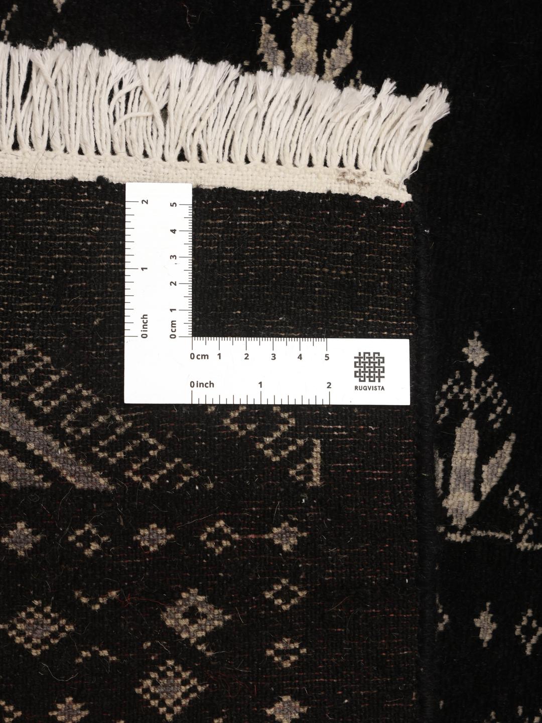 Tapis fait main du Pakistan en couleur noire