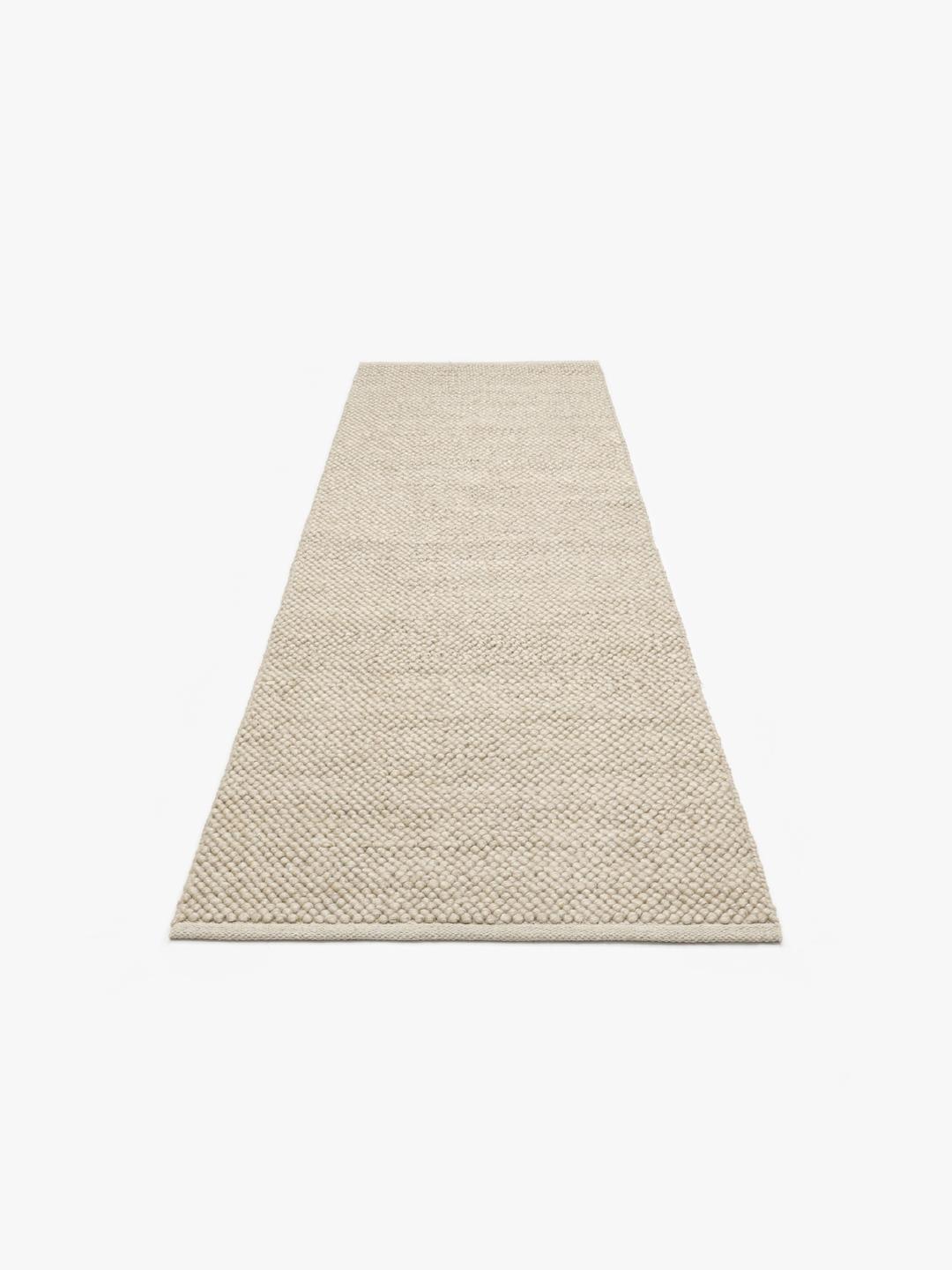 Handgeweven beige loper vloerkleed met een getextureerd bubbelpatroon