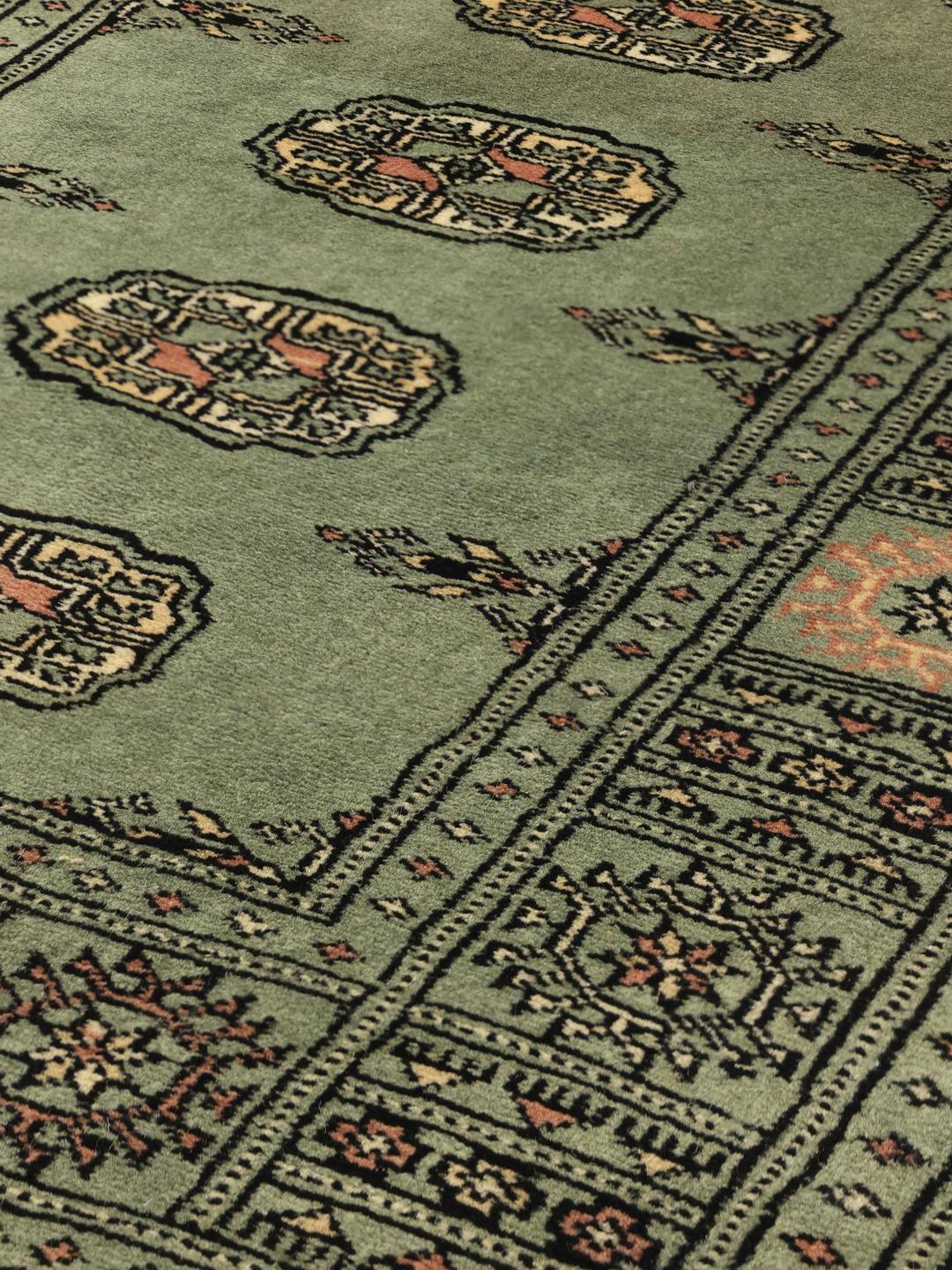 Runner rug from Pakistan in green