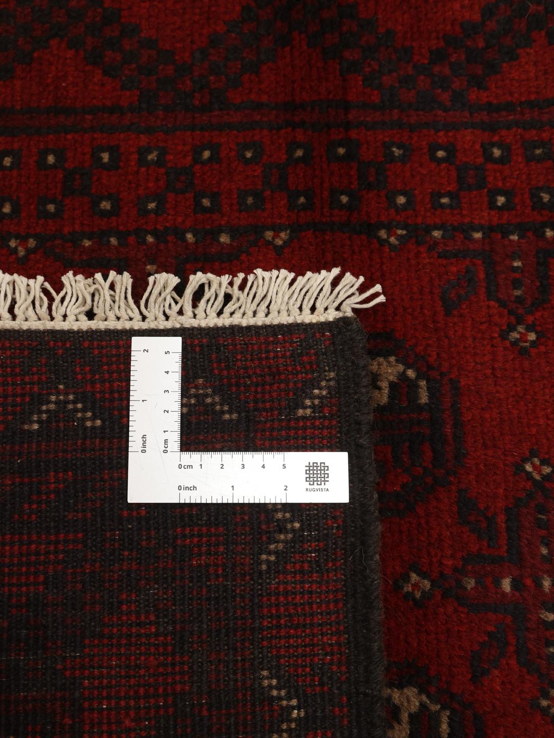 Afghan loper in rood