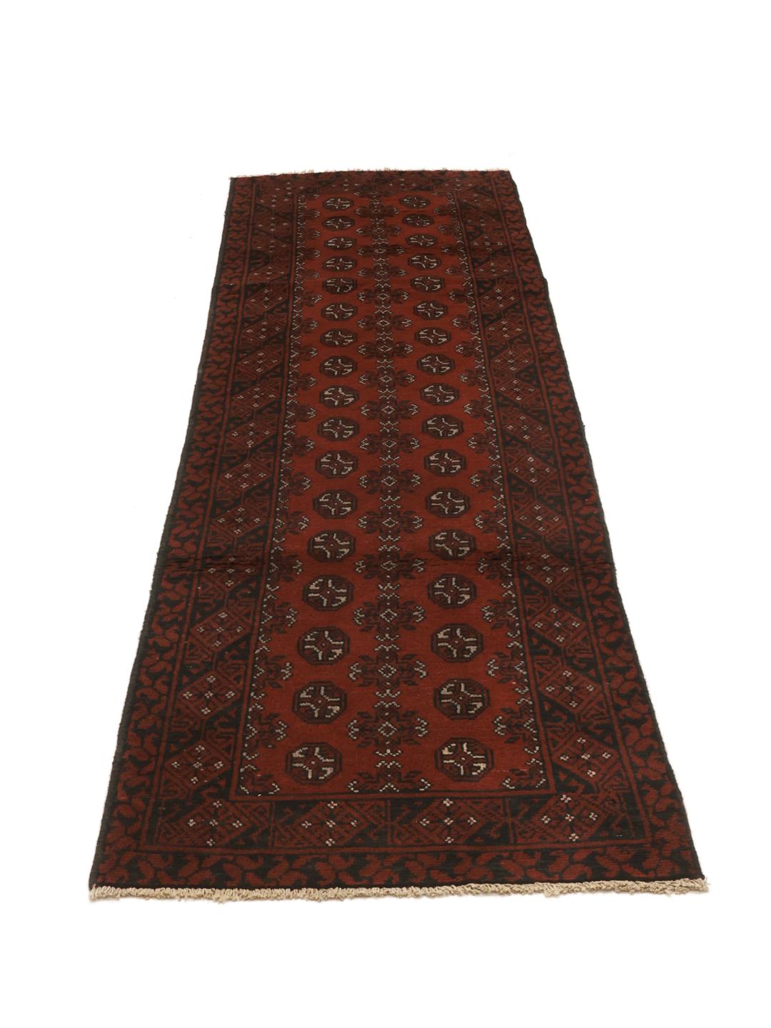 Tapis couloir afghan rouge avec des motifs traditionnels