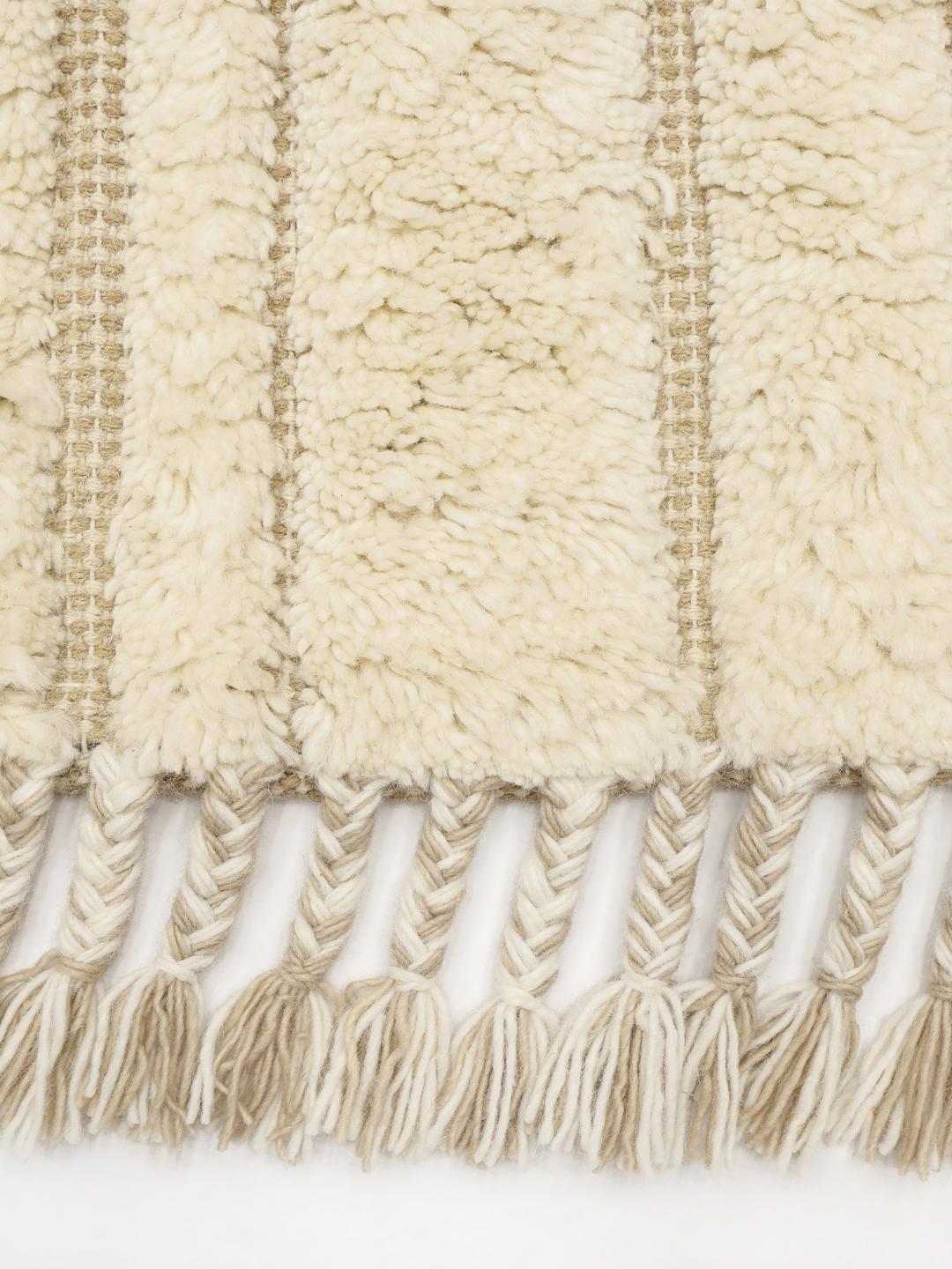 Ivoorwit poolkleed met golvende beige lijnen en franjes
