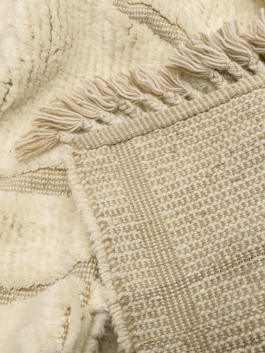 Ivoorwit poolkleed met golvende beige lijnen en franjes