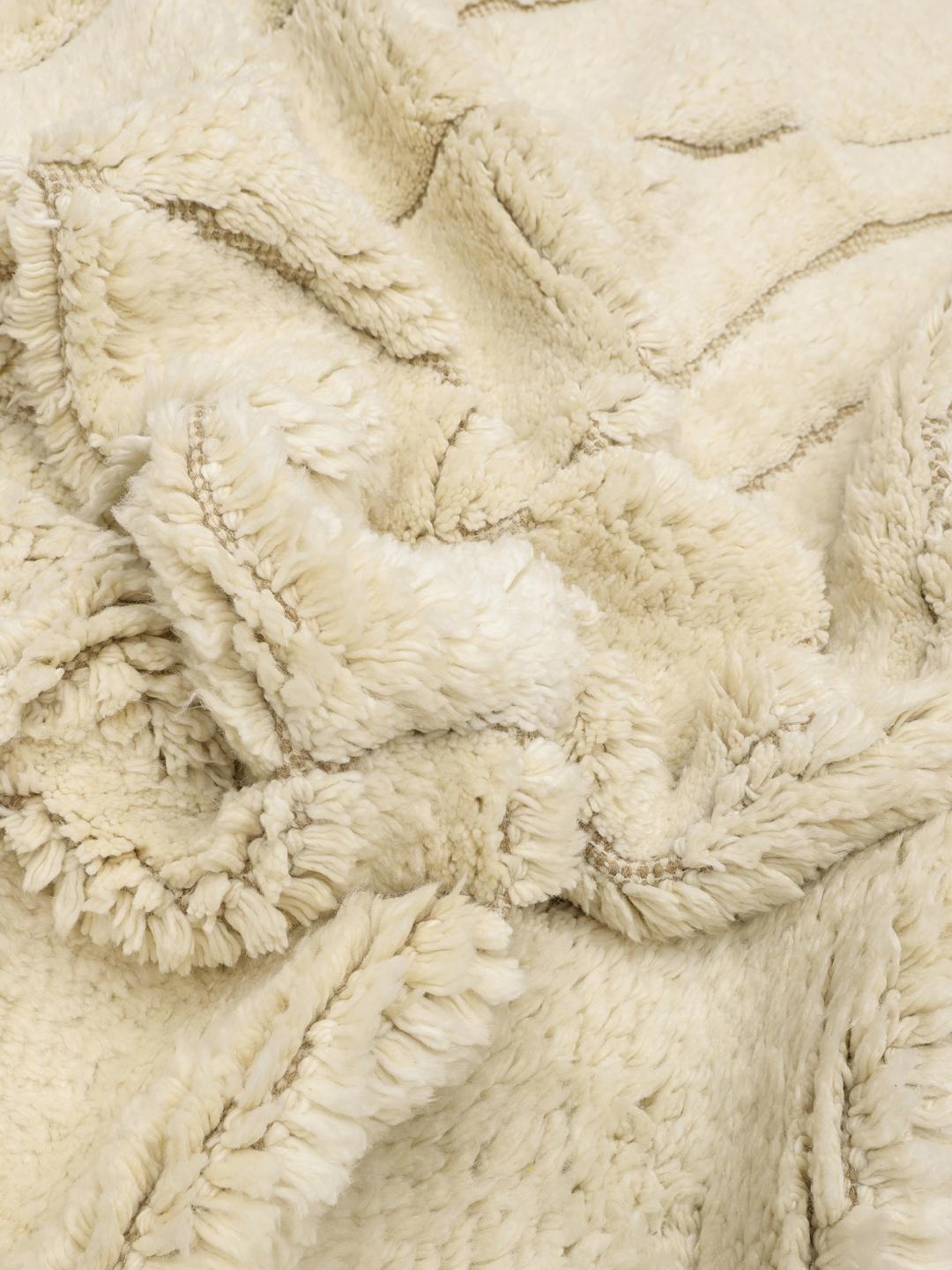 Ivoorwit poolkleed met golvende beige lijnen en franjes