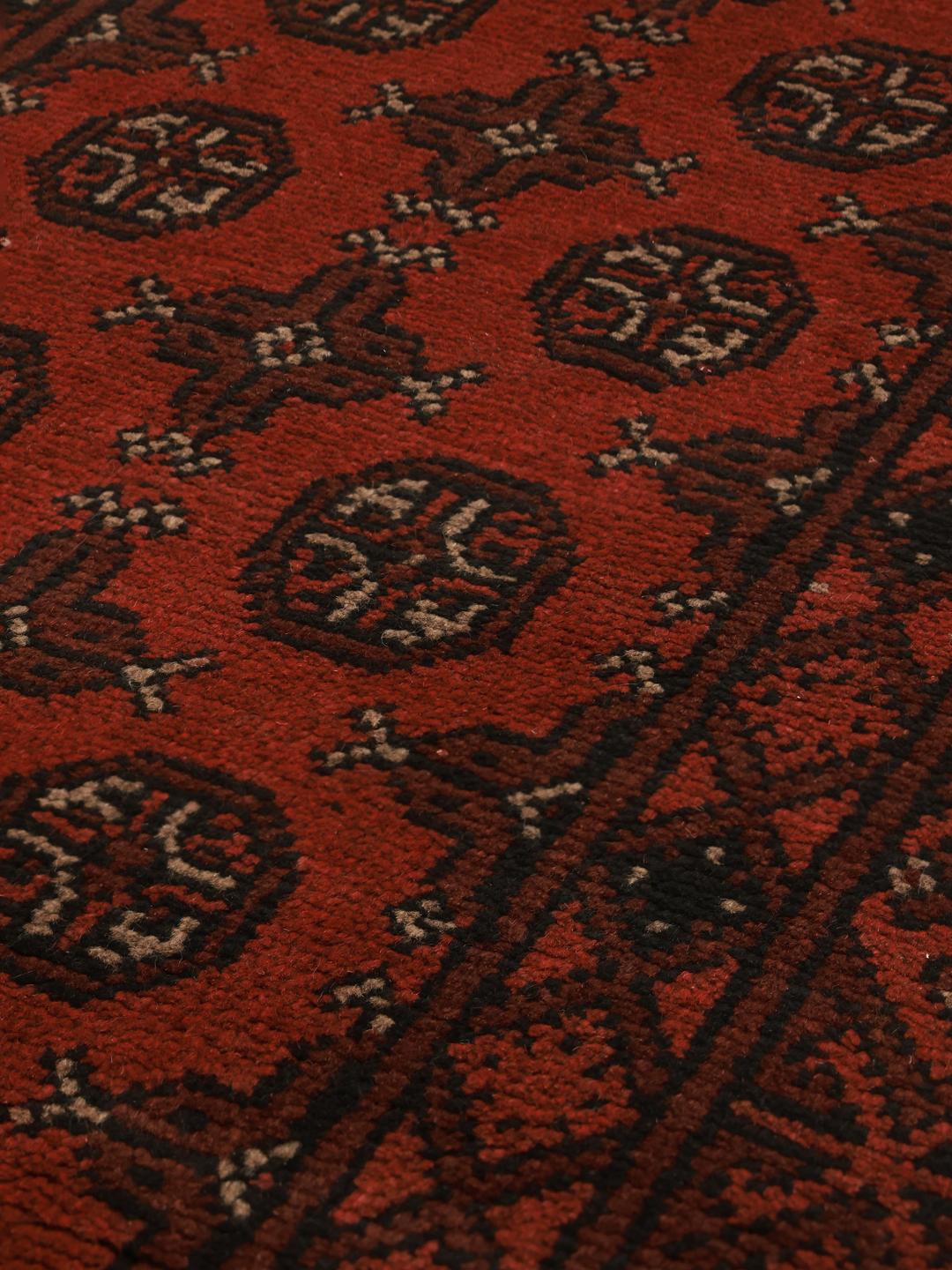 Handgeknoopt wollen loper vloerkleed uit Afghanistan in donkerrood en zwart